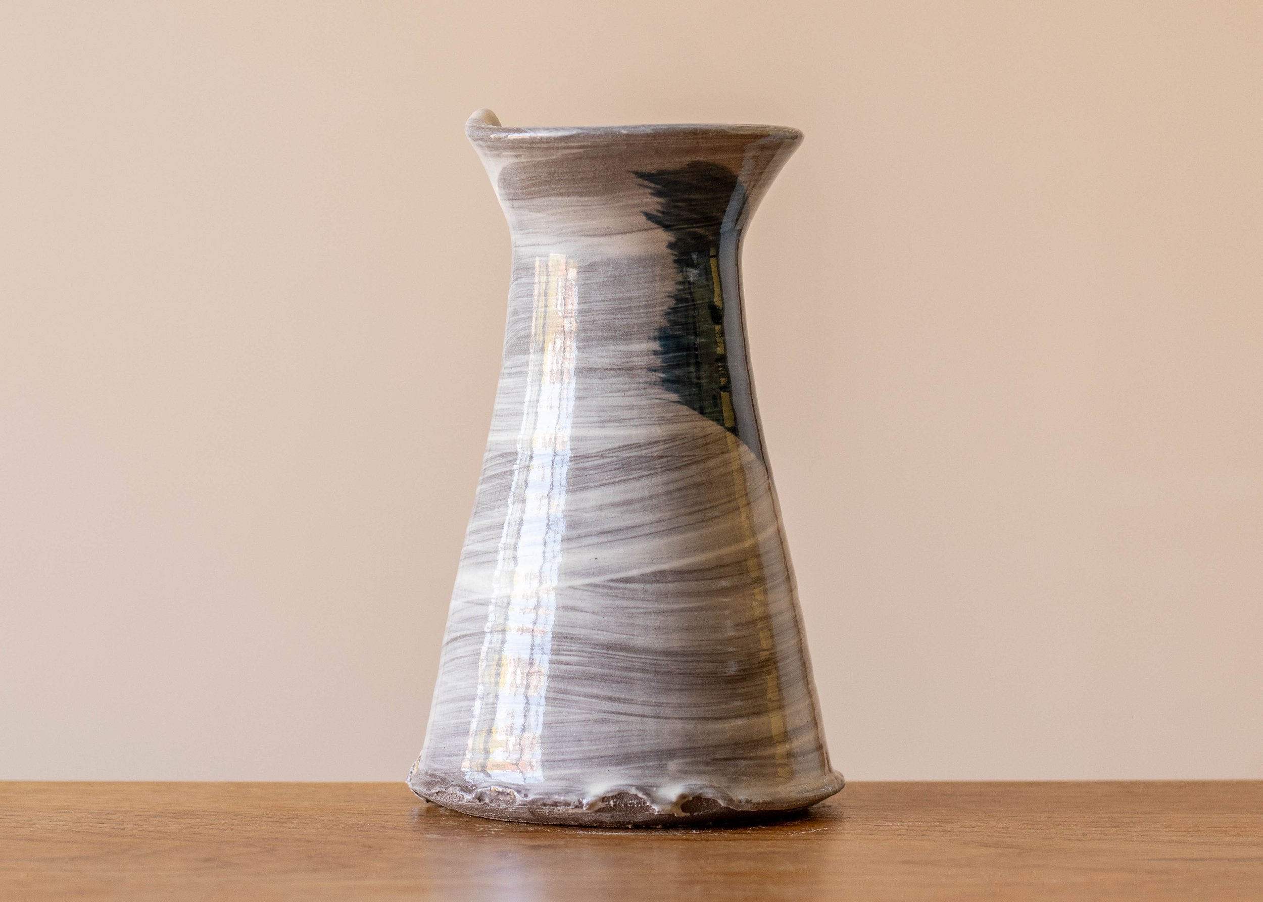 Small handmade stoneware vase with blue brushmarks #5, view of the second side.jpg