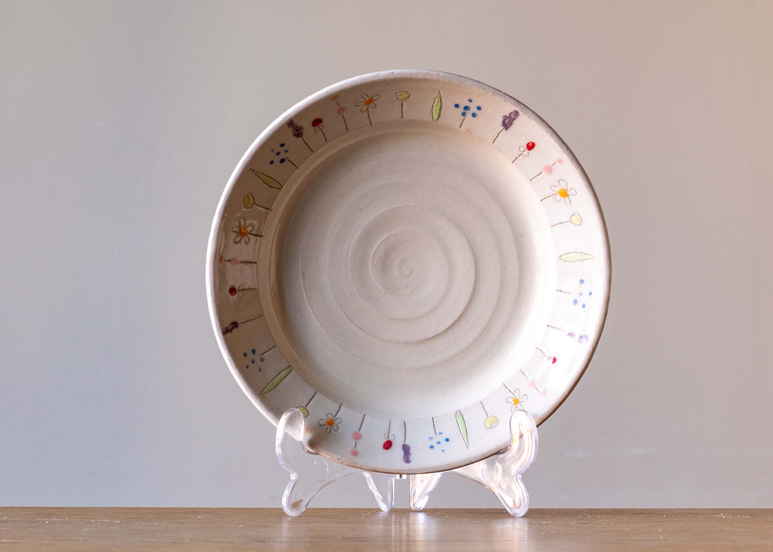 White Handmade pottery Small Plate with Midsummer Flower Design.jpg