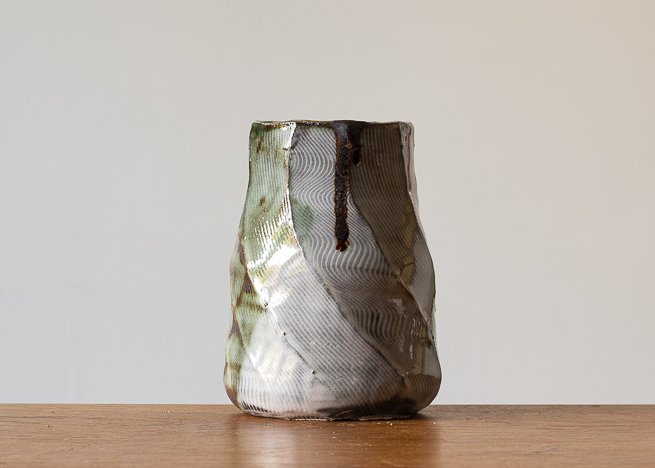 Faceted vase with green brush marks, view 3.jpg