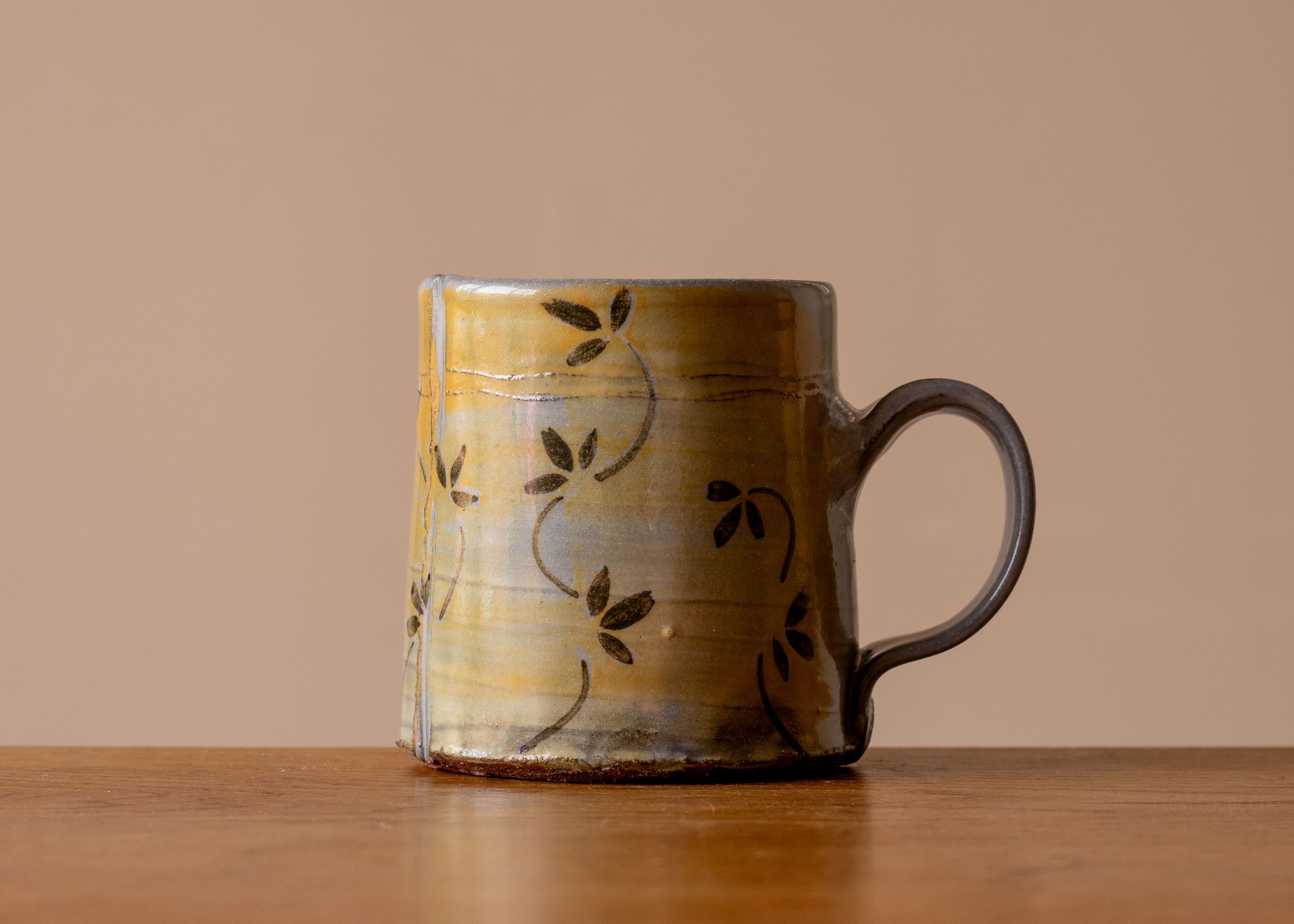 Handmade Pottery Mug with yellow and borwn autumn leaf decoration, side 3.jpg