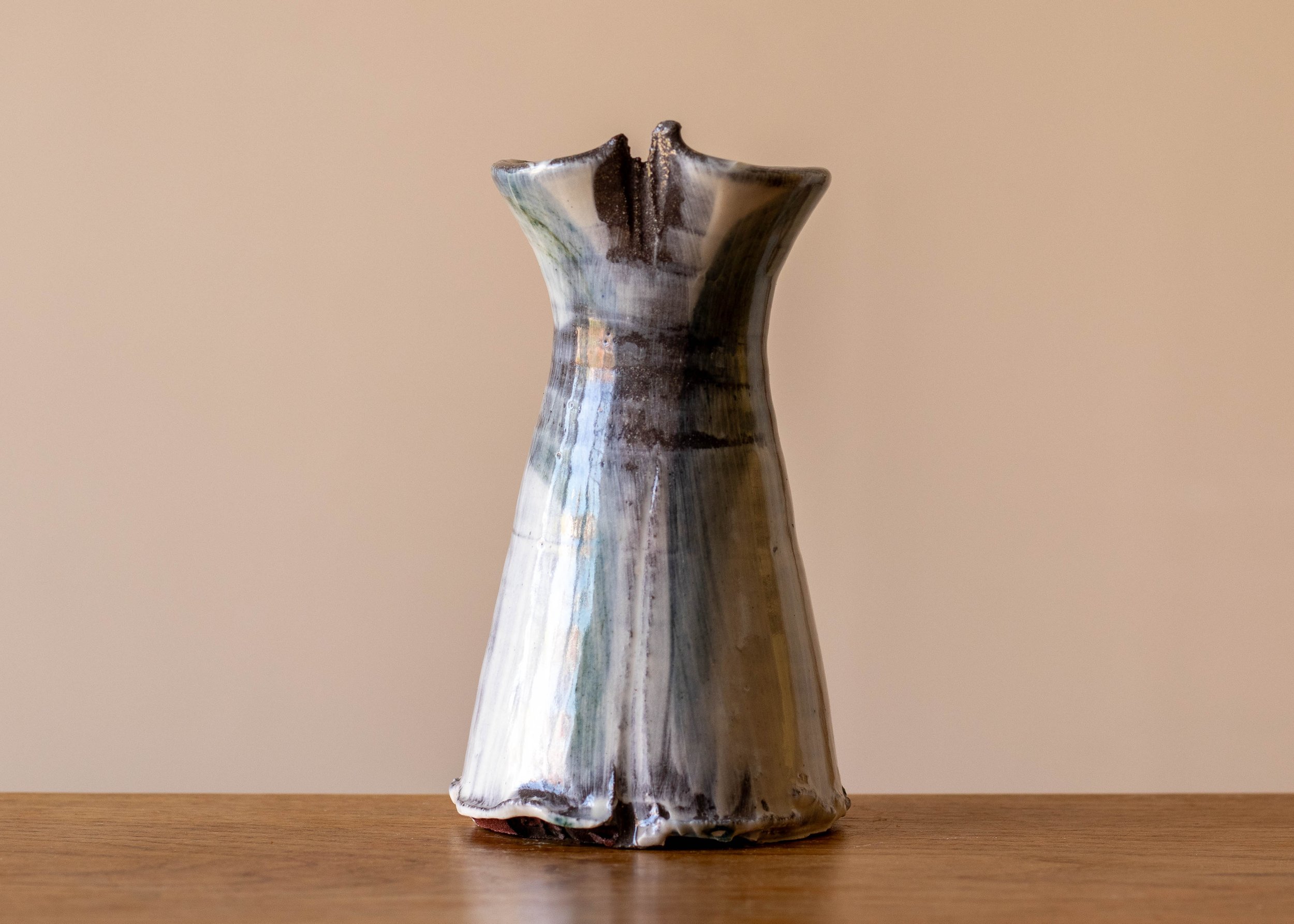 Small handmade stoneware vase with turquoise brushmarks.jpg