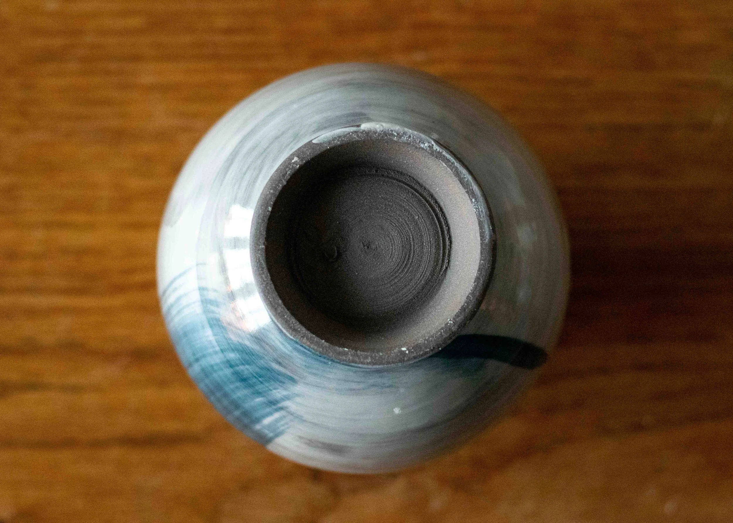 Small White Moon Jar or Bud Vase with Blue Brushed Decoration, view from below.jpg