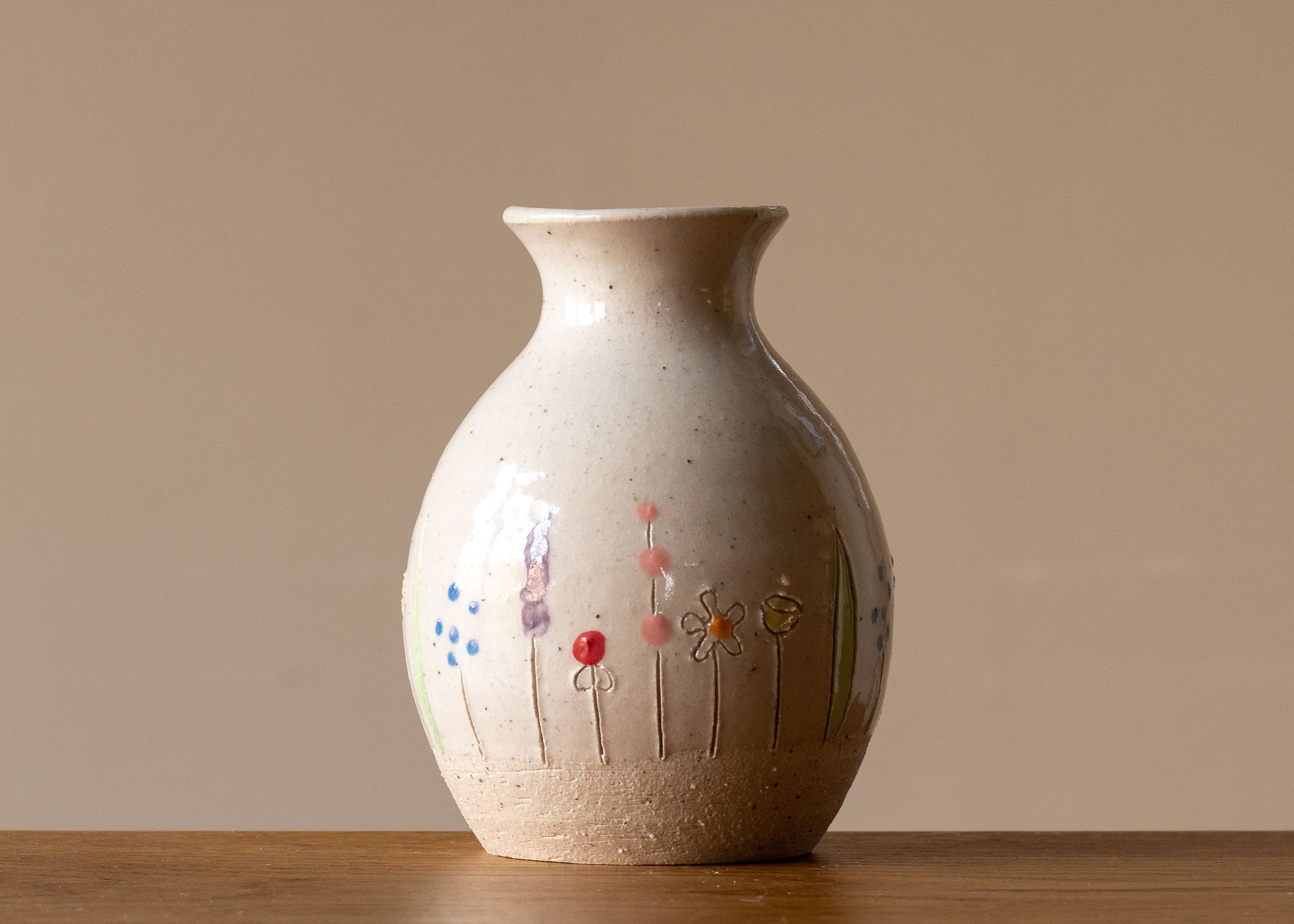 Small White Handmade Pottery Bud Vase with Midsummer Flower Design.jpg