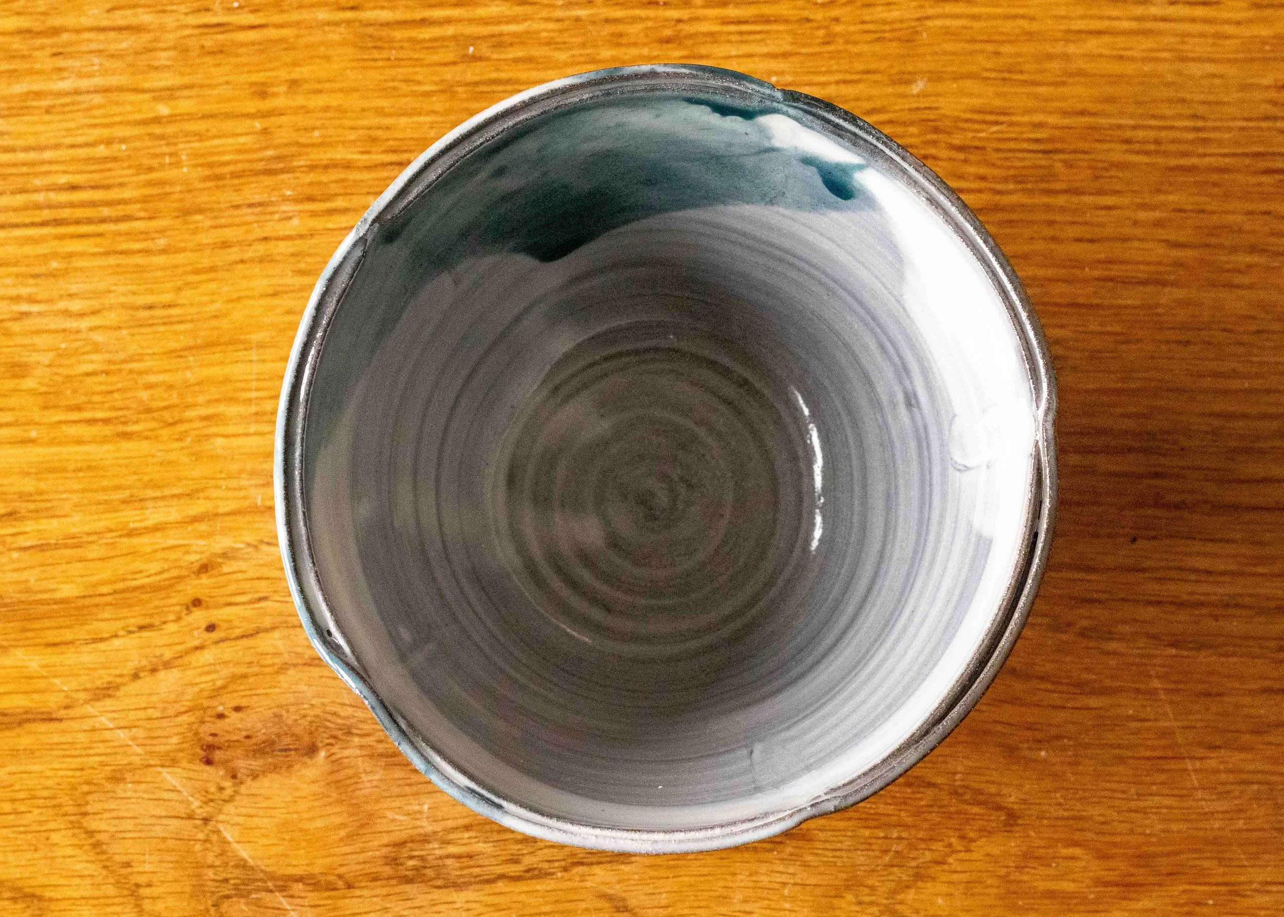 Small white bowl with green  brush marks, view of the inside.jpg