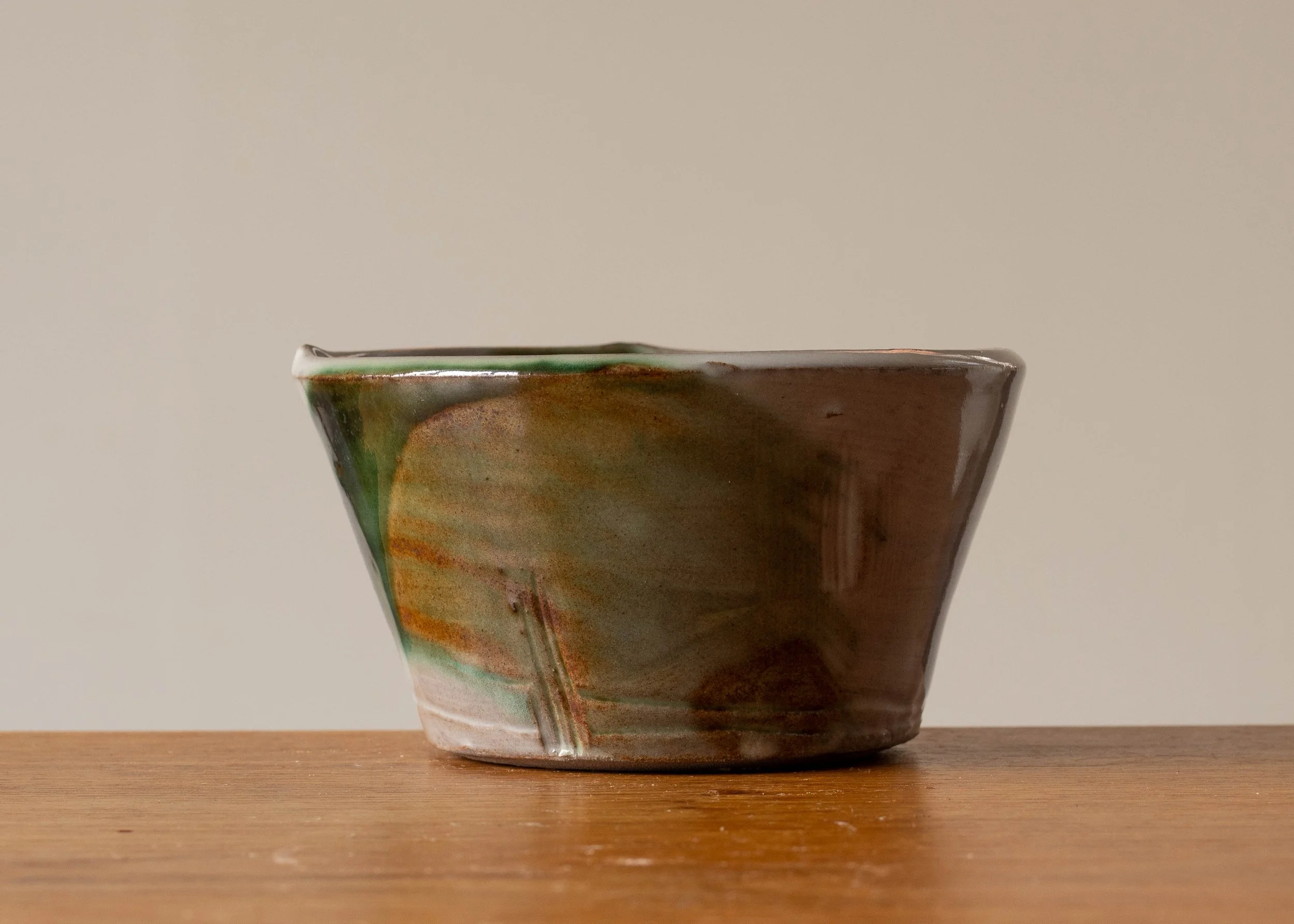 Small Handmade Pottery Bowl with Green Decoration.jpg