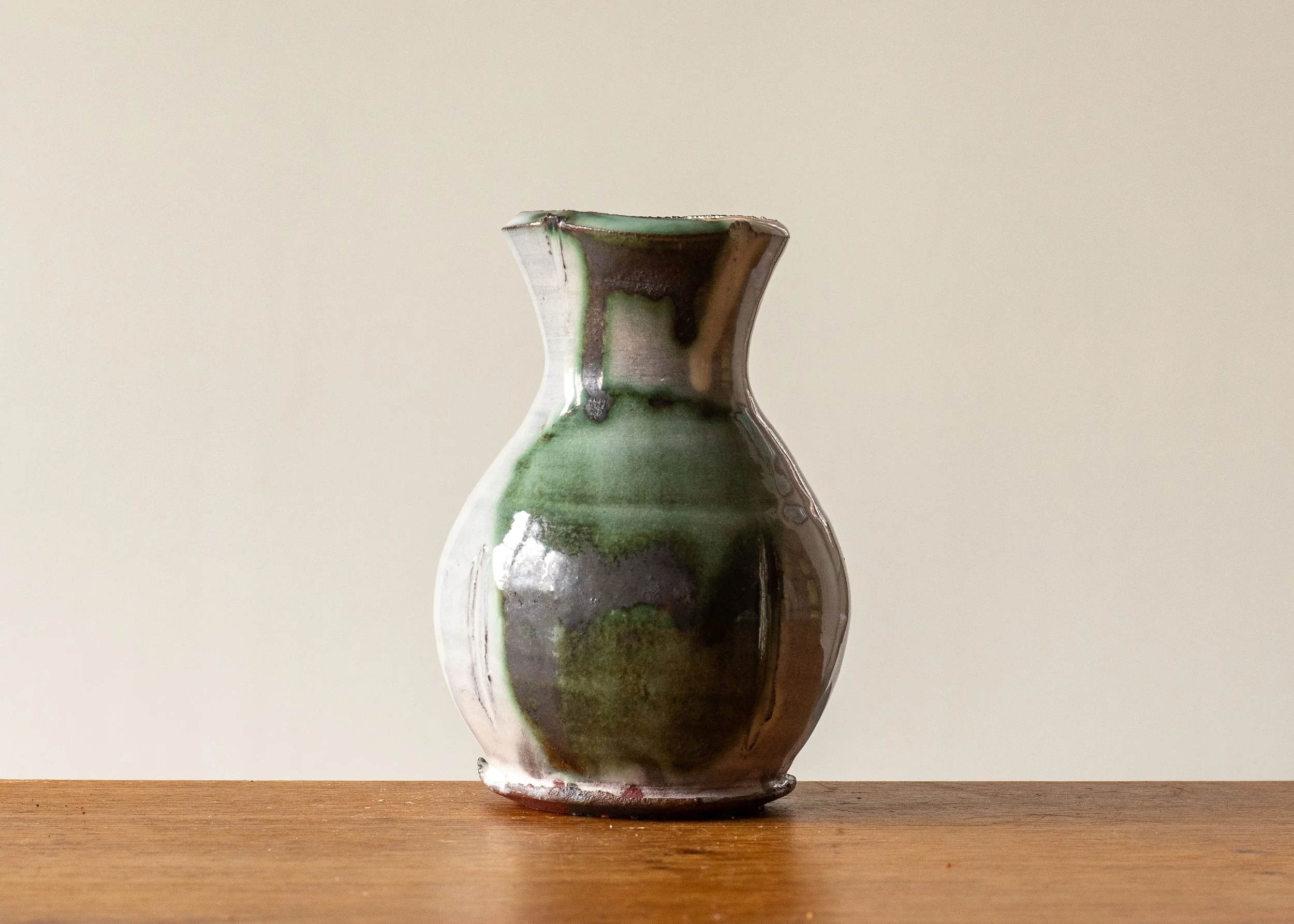 Small Handmade Pottery Vase with Green Brush Mark, view 1.jpg