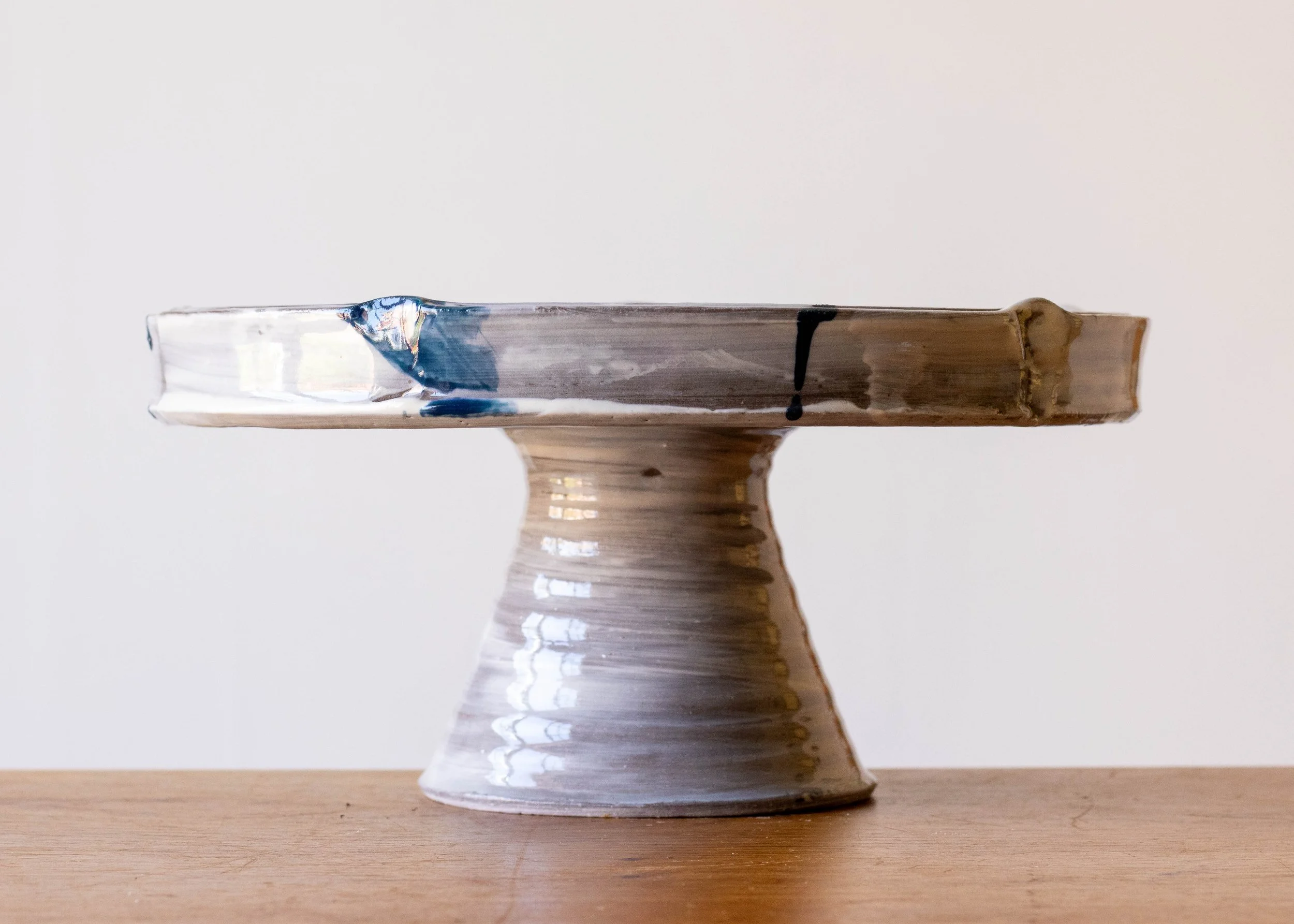 Handmade Pottery Pedestal Plate with Blue Brush Marks.jpg