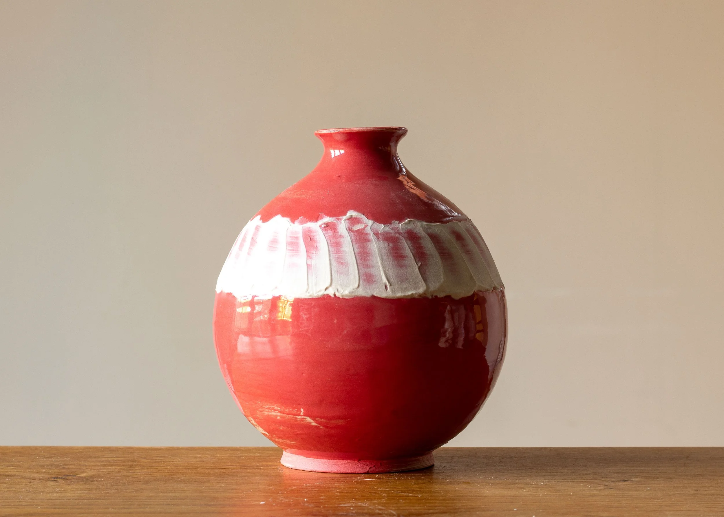 Medium Pale Red Moon Jar with White Decoration, side 4.jpg