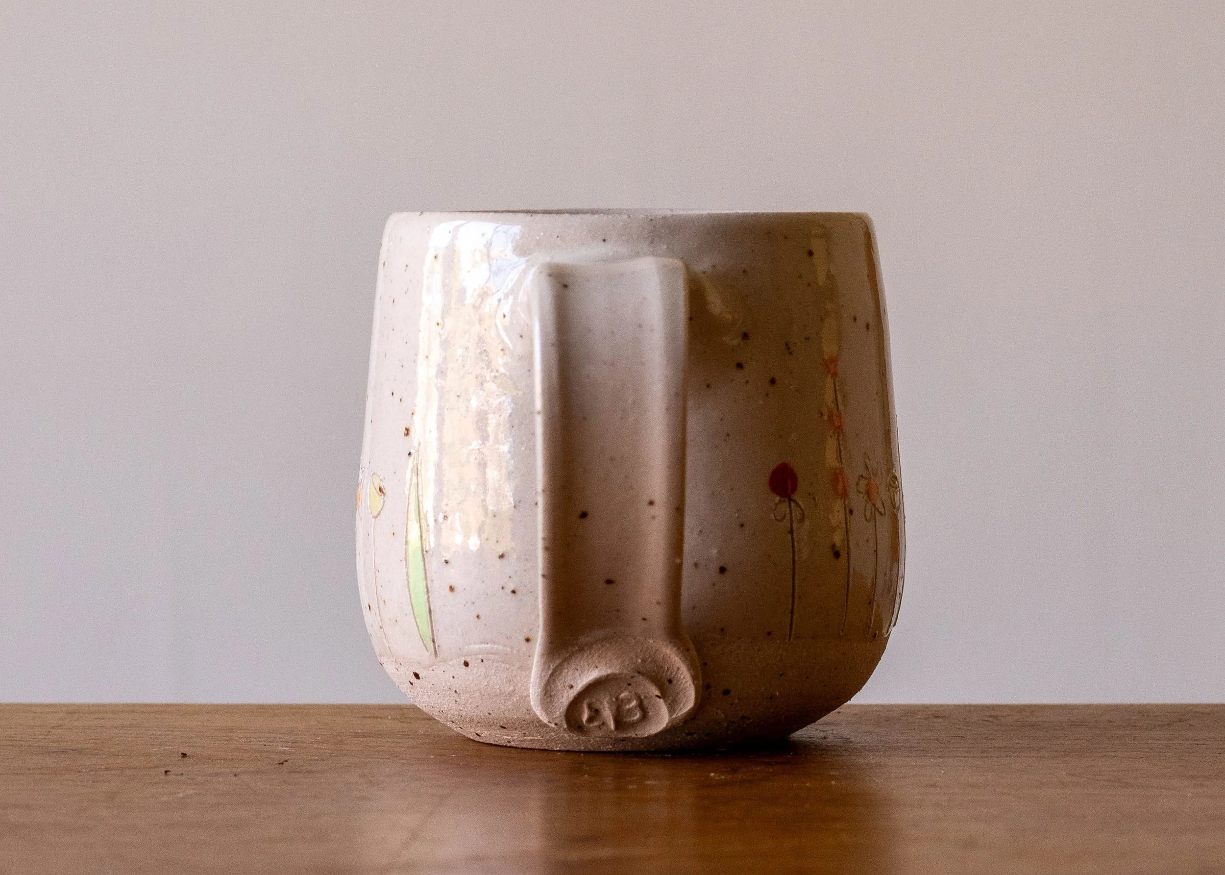 White Handmade Pottery Mug with Midsummer Flower Design, view 4.jpg