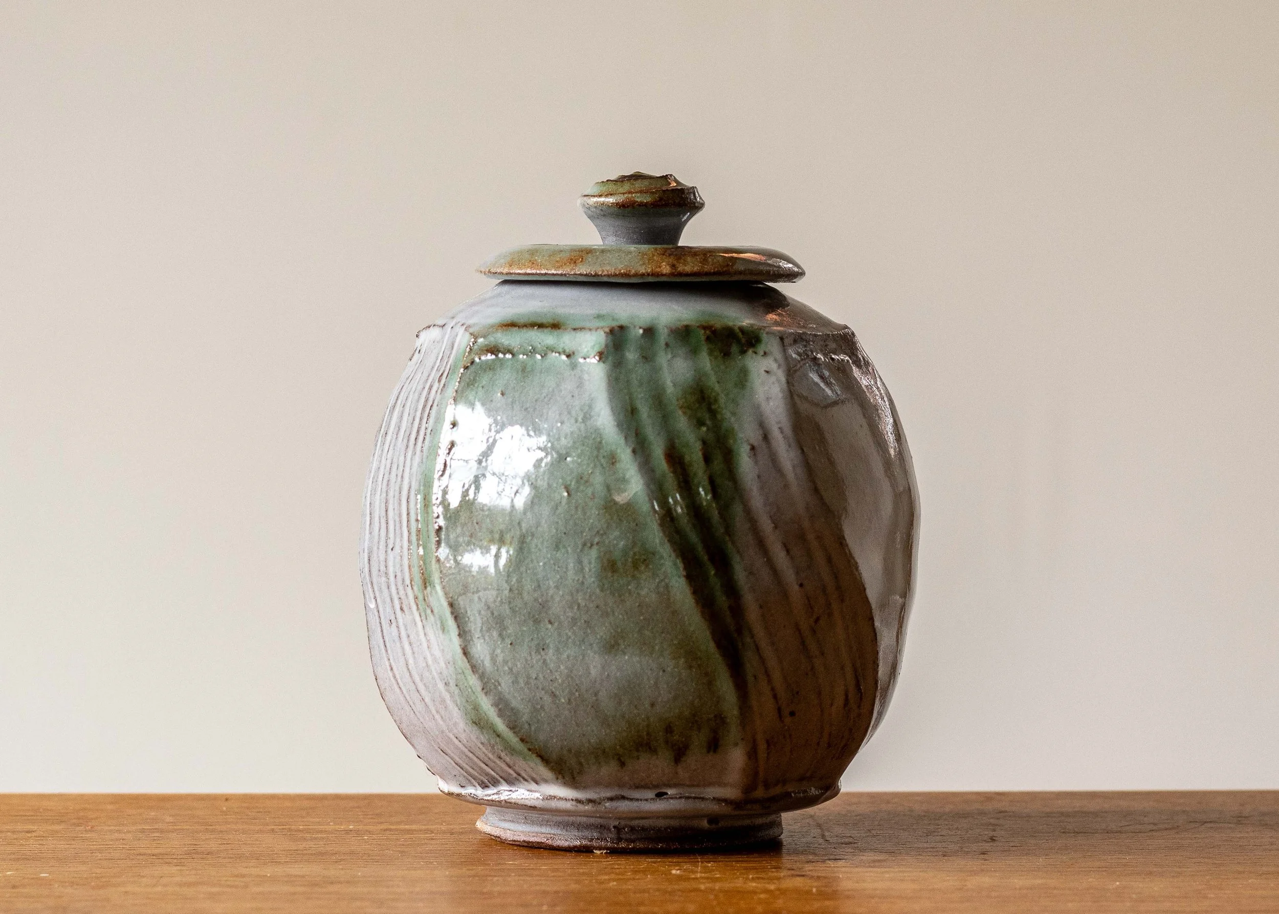 Small Faceted & Textured Lidded Pot with Green Brush Mark, view 1.jpg