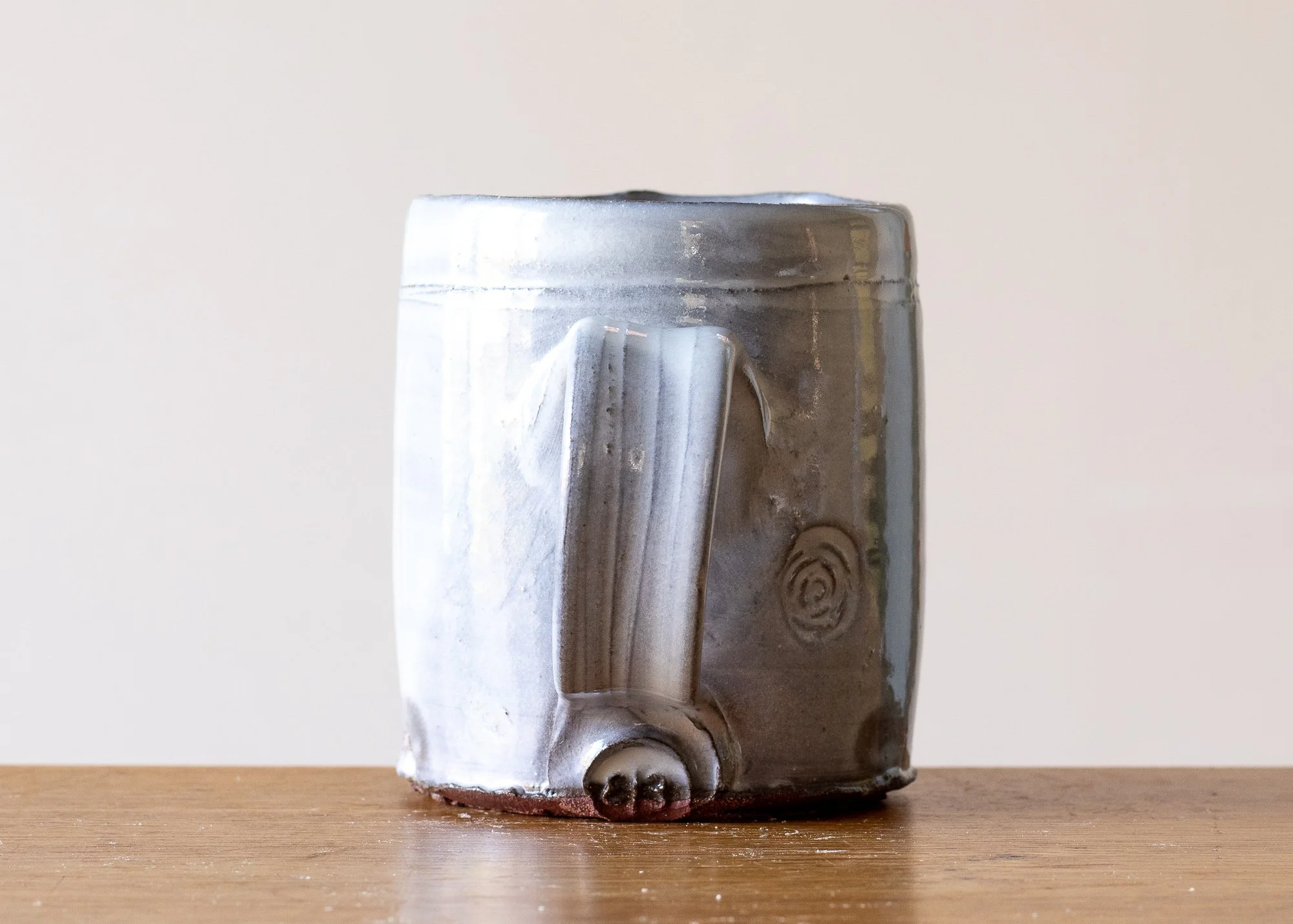 Small Handmade Pottery Coffee Cup with Turquoise Brushed Decoration, side 3.jpg