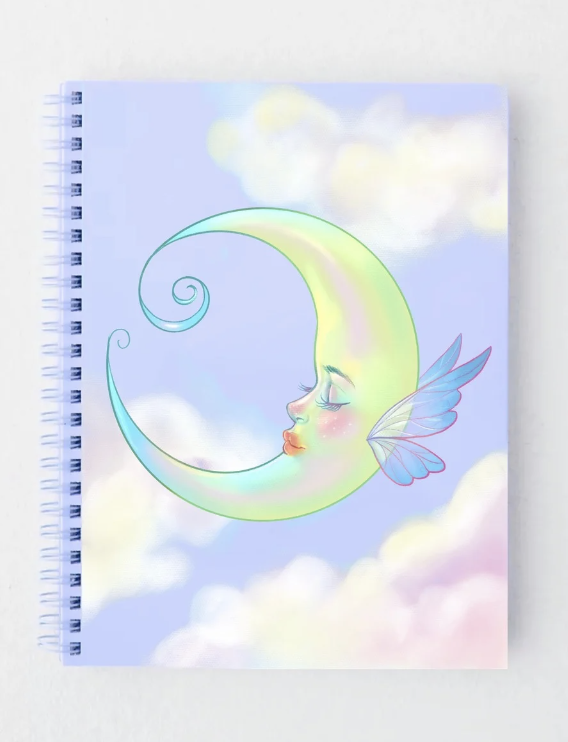 spiral notebook of a Crescent moon  with fairy wings on a a light blue sky full of pastel clouds