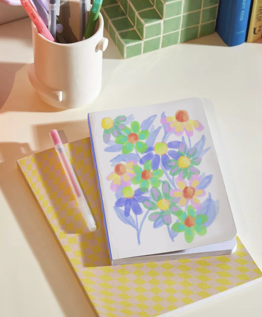 Bright colored flowers printed on a notebook