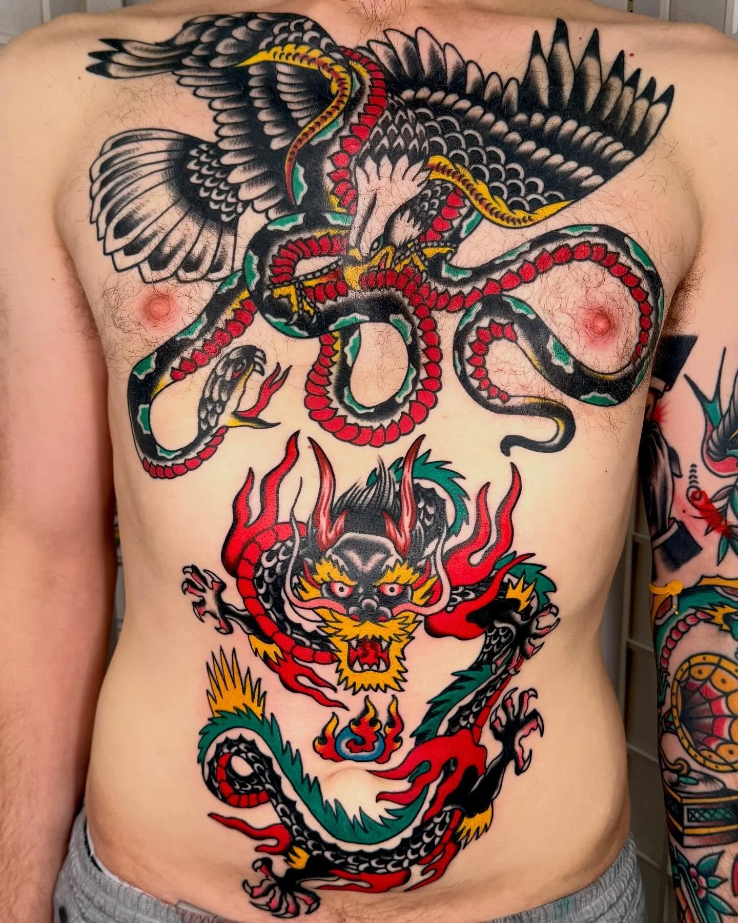 Colin is tough. Added this dragon to his front, chest is healed. Made at Vancouver&rsquo;s finest 🕉️ @showtimetattooco ☮️