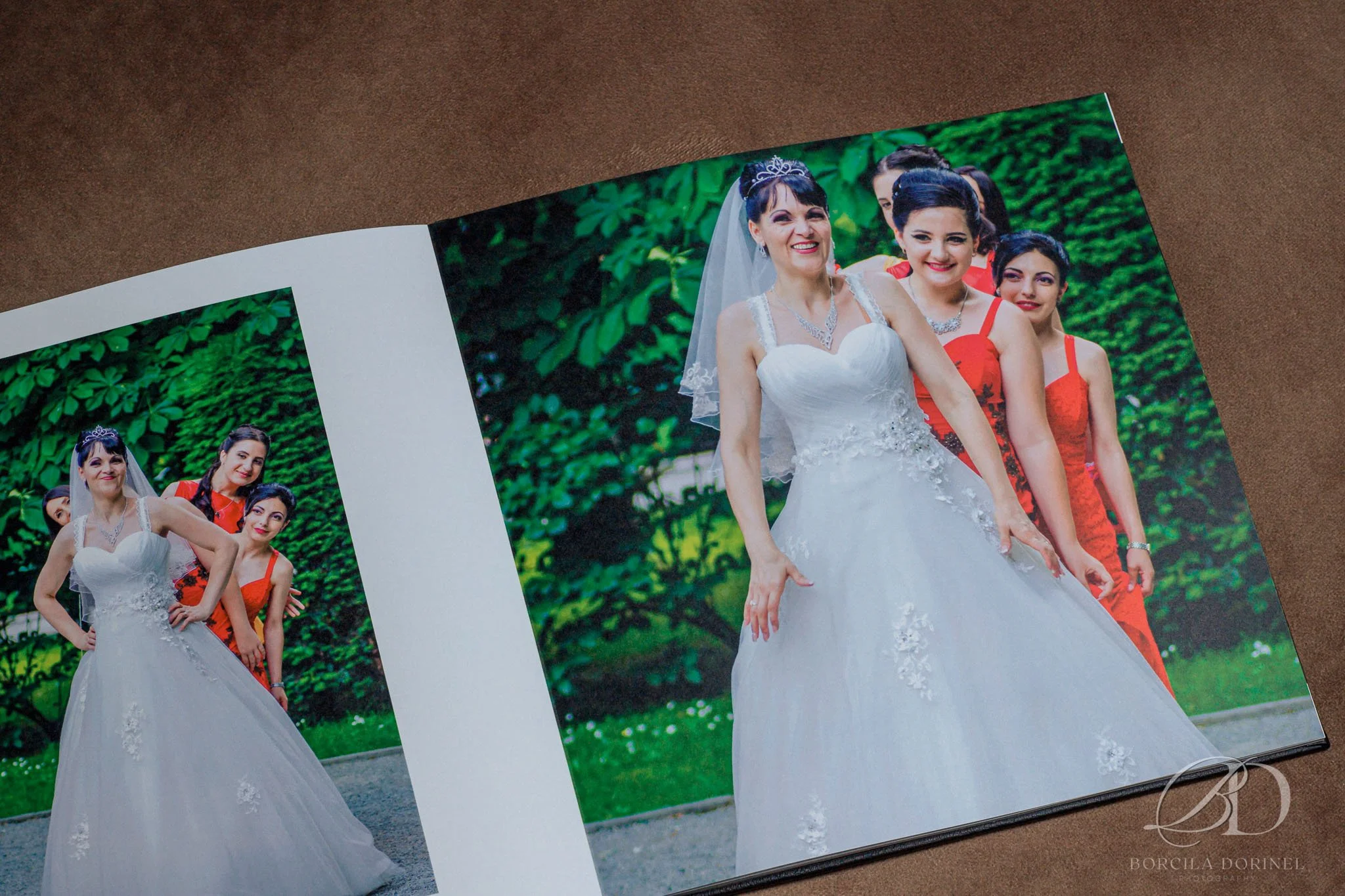 A professional wedding photo album featuring two brides and one bride, showcasing their special moments together.