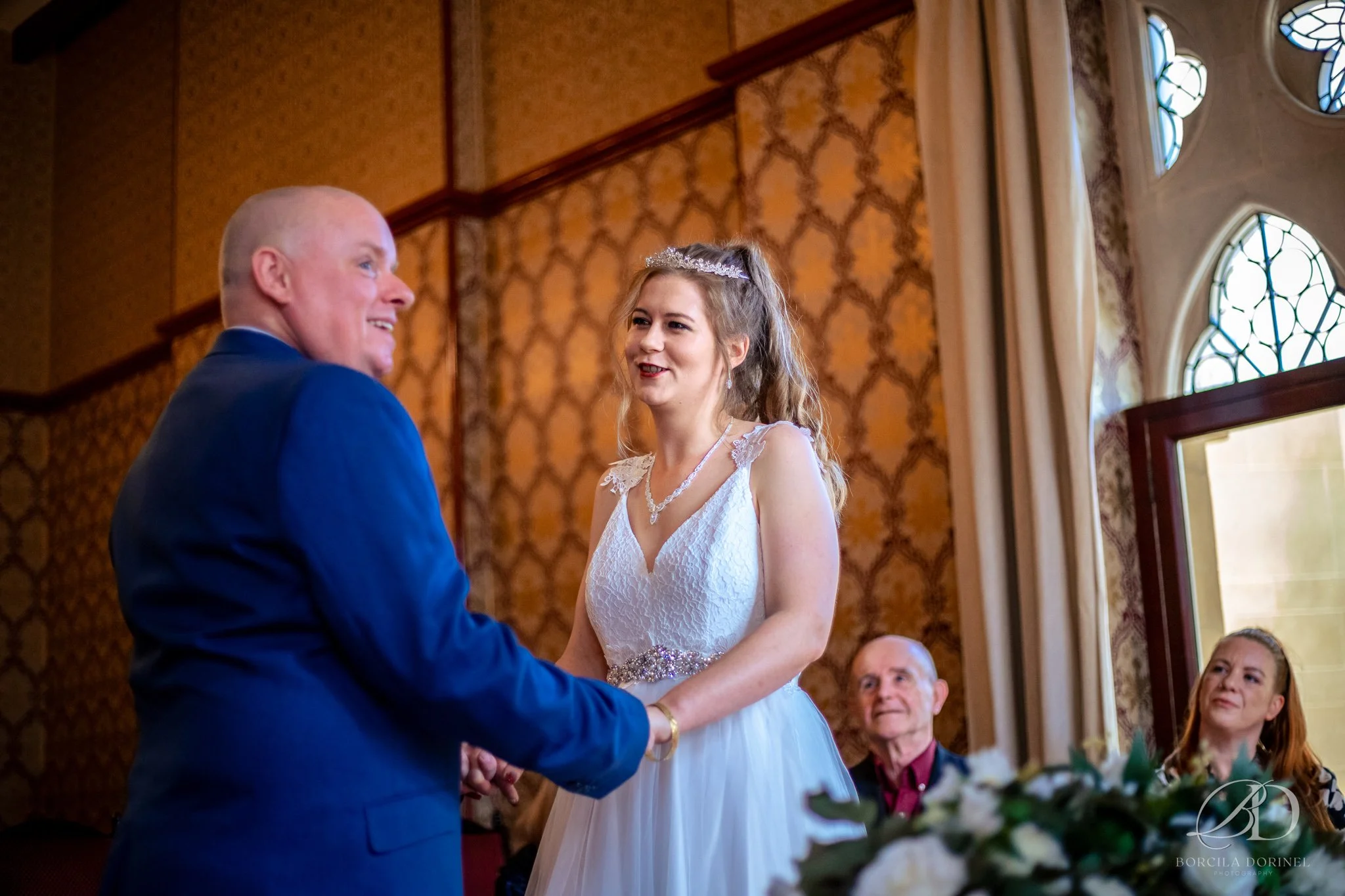 Bride and groom interacting naturally captured by documentary wedding photographer
