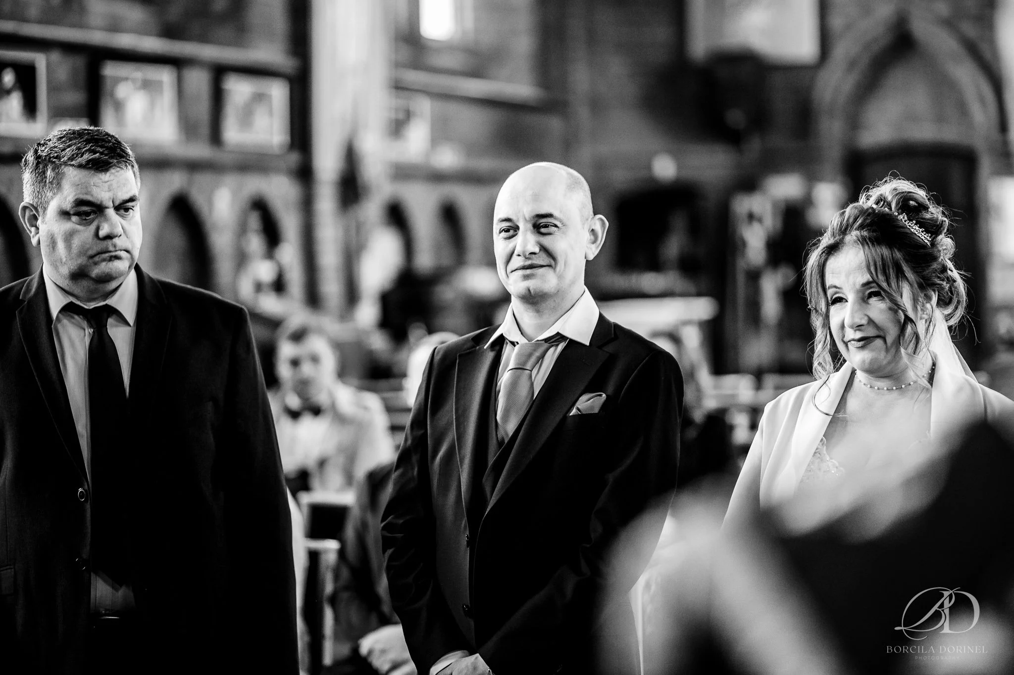 Natural wedding photography showing connection between couple and family