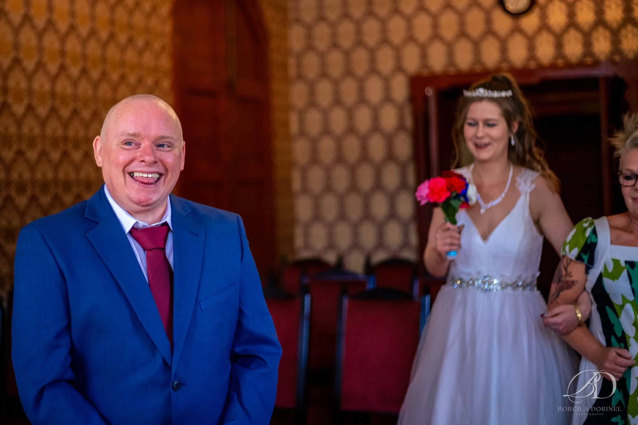 Authentic wedding photography capturing emotional guest reaction
