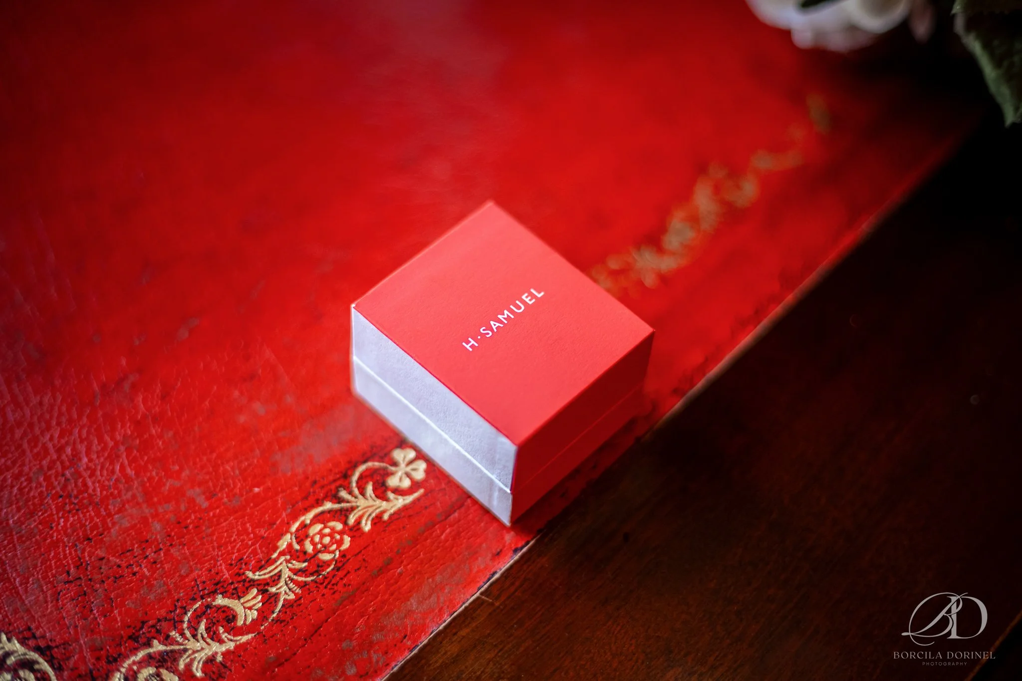 Wedding photography portfolio: wedding rings red box captured by borcila dorinel photography documentary wedding photographer in northampton natural storytelling for relaxed couples