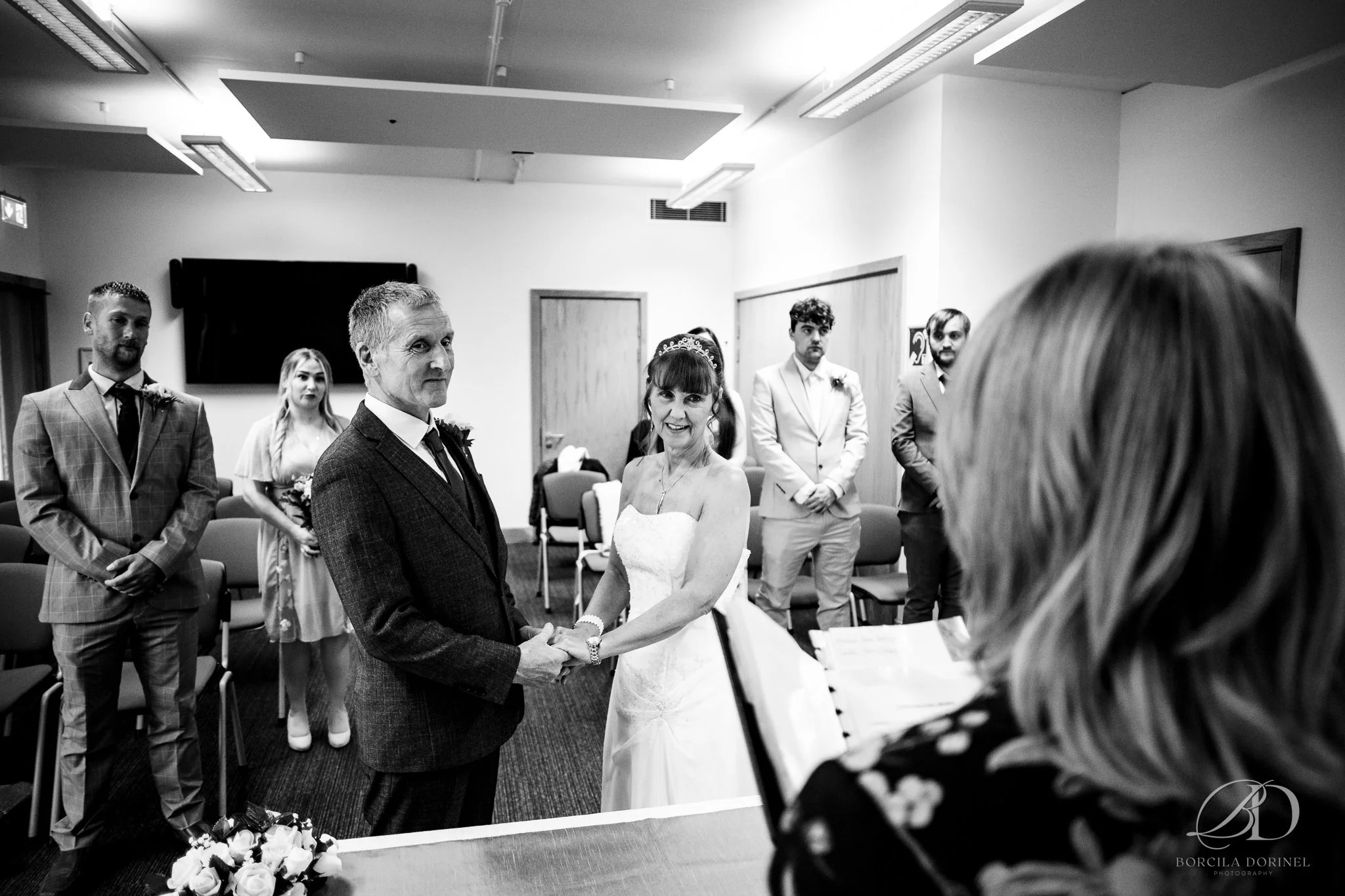 Documentary wedding photography Northampton capturing candid guest laughter
