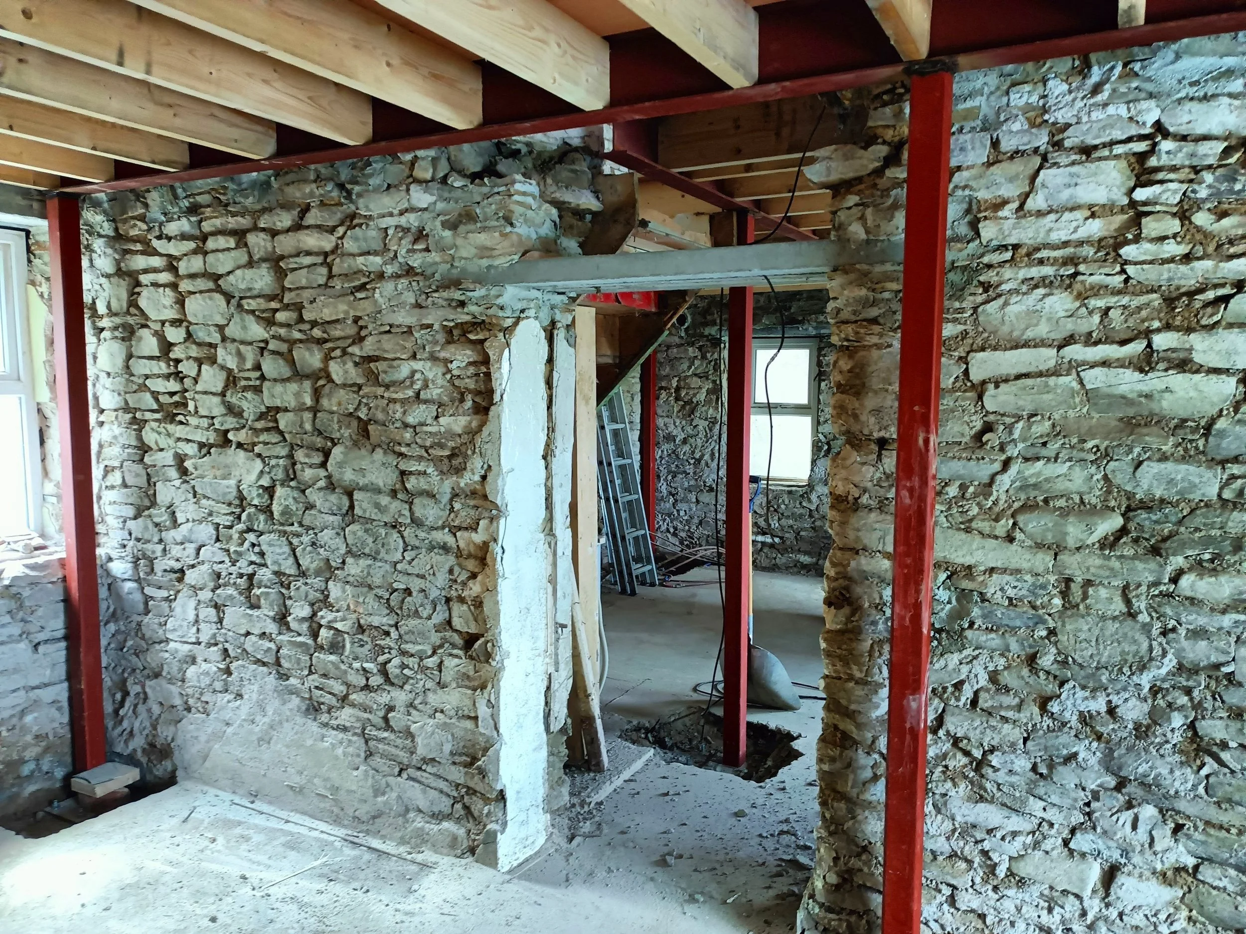 3 Pointed Panel Before Existing Rough Stone.jpg