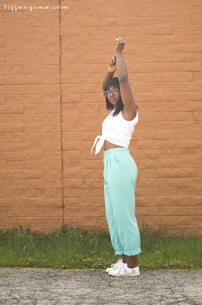Vintage mint pants with a sleeveless white tie front button down top. Paired with my bingo sneakers.