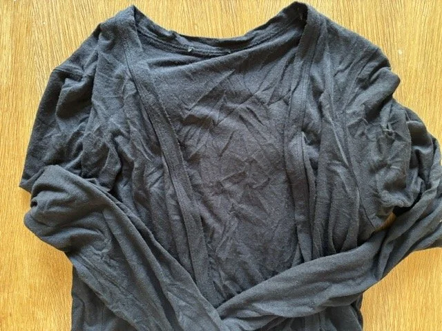 Thin black adult cardi (labels cut out) left at LHH 12/07/26