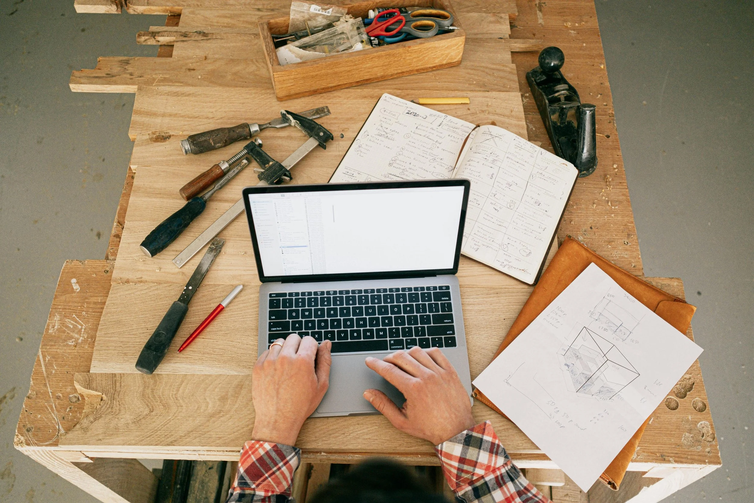 Homeowner researching renovation plans before starting a home improvement project in Hertfordshire