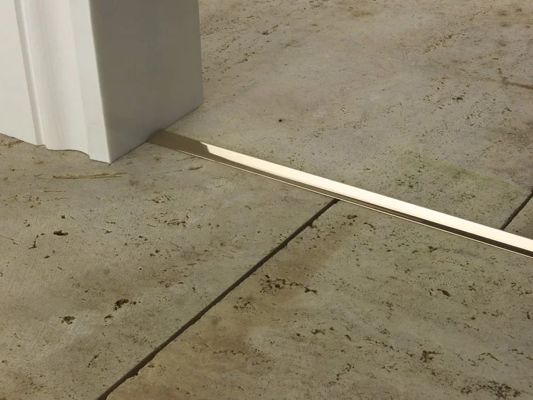 door_bar_little_t_brass.jpg