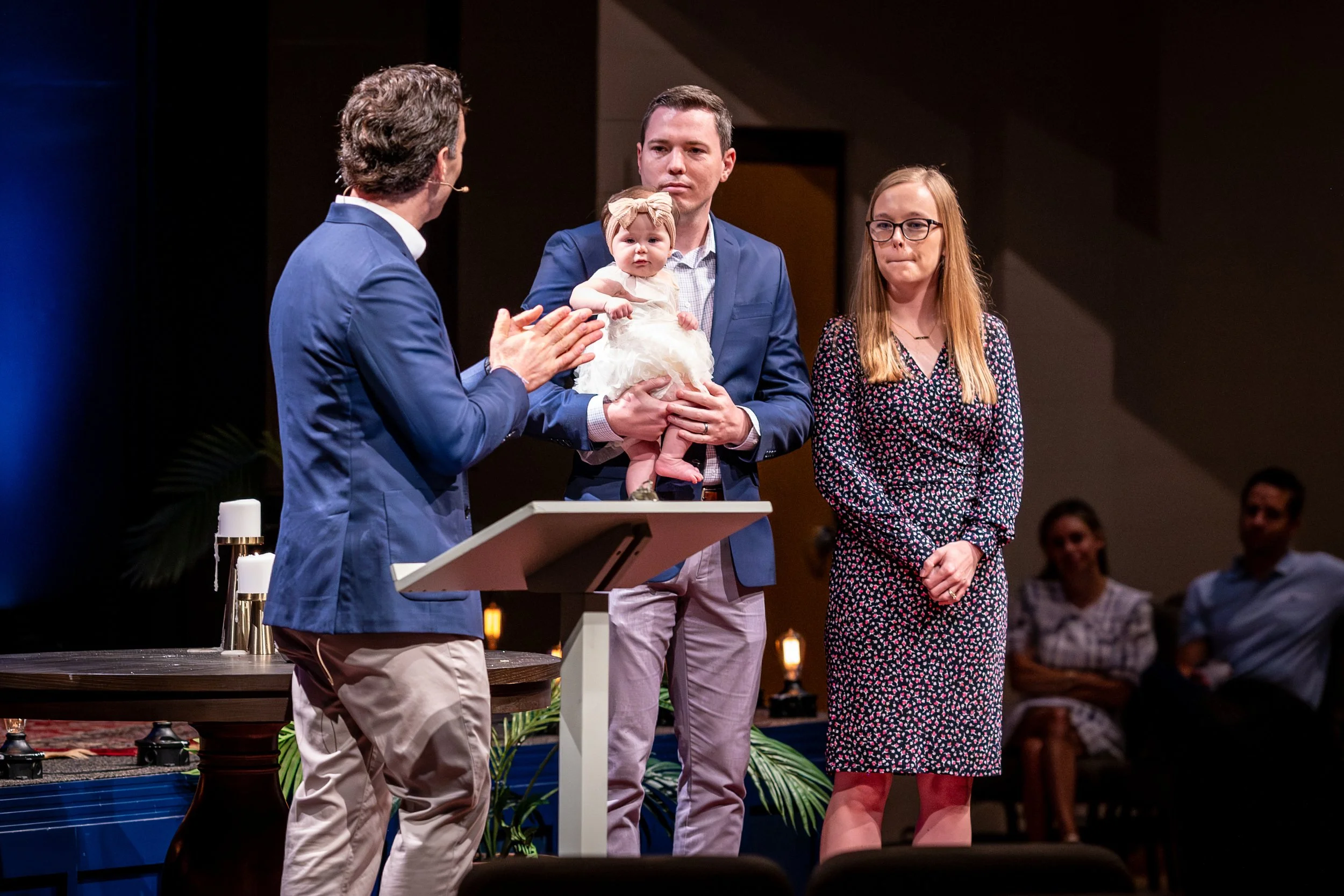 Lead Pastor John Bourgeois baptizing a child during worship service at West End Community Church in Nashville, TN.