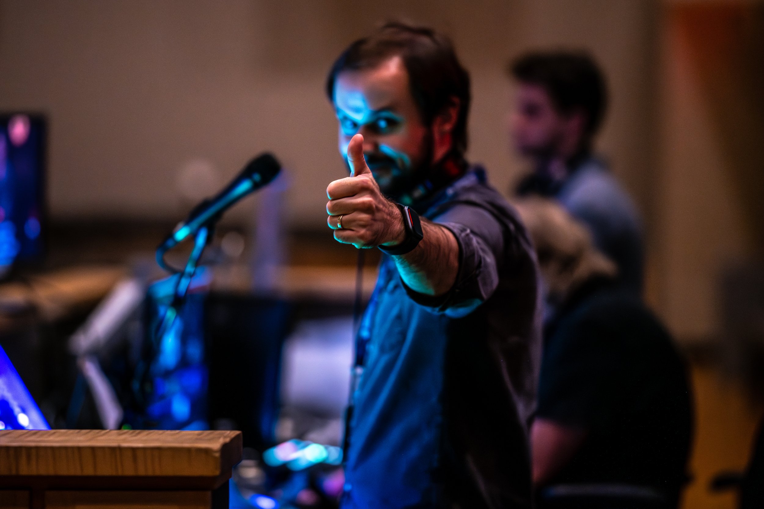 Man volunteering in the sound booth