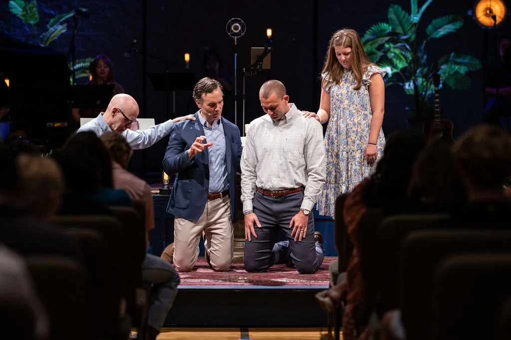 Lead Pastor John Bourgeois baptizing an adult church member during worship service at West End Community Church in Nashville, TN.