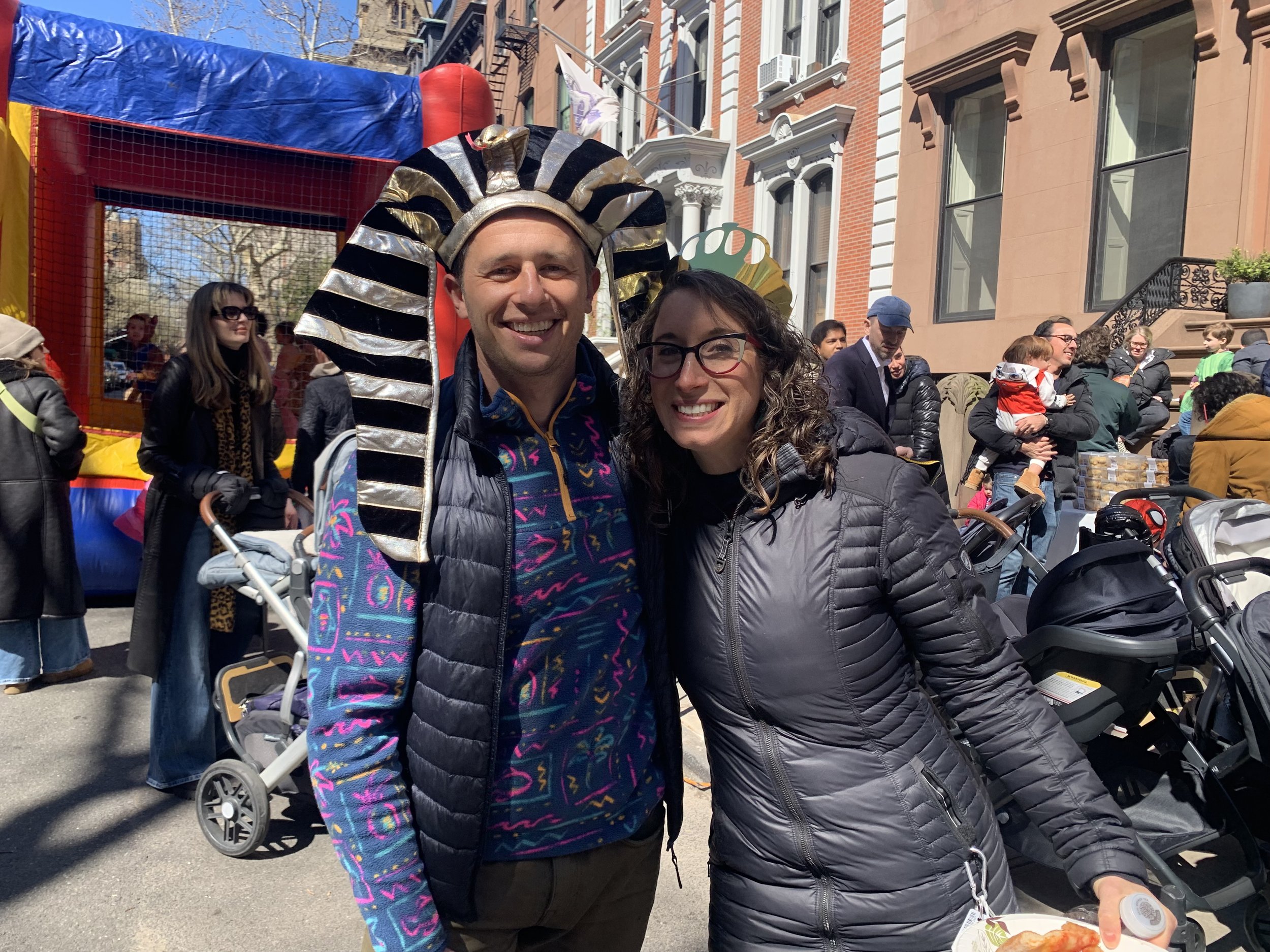 two costumed synagogue members pose at the purim carnival festival