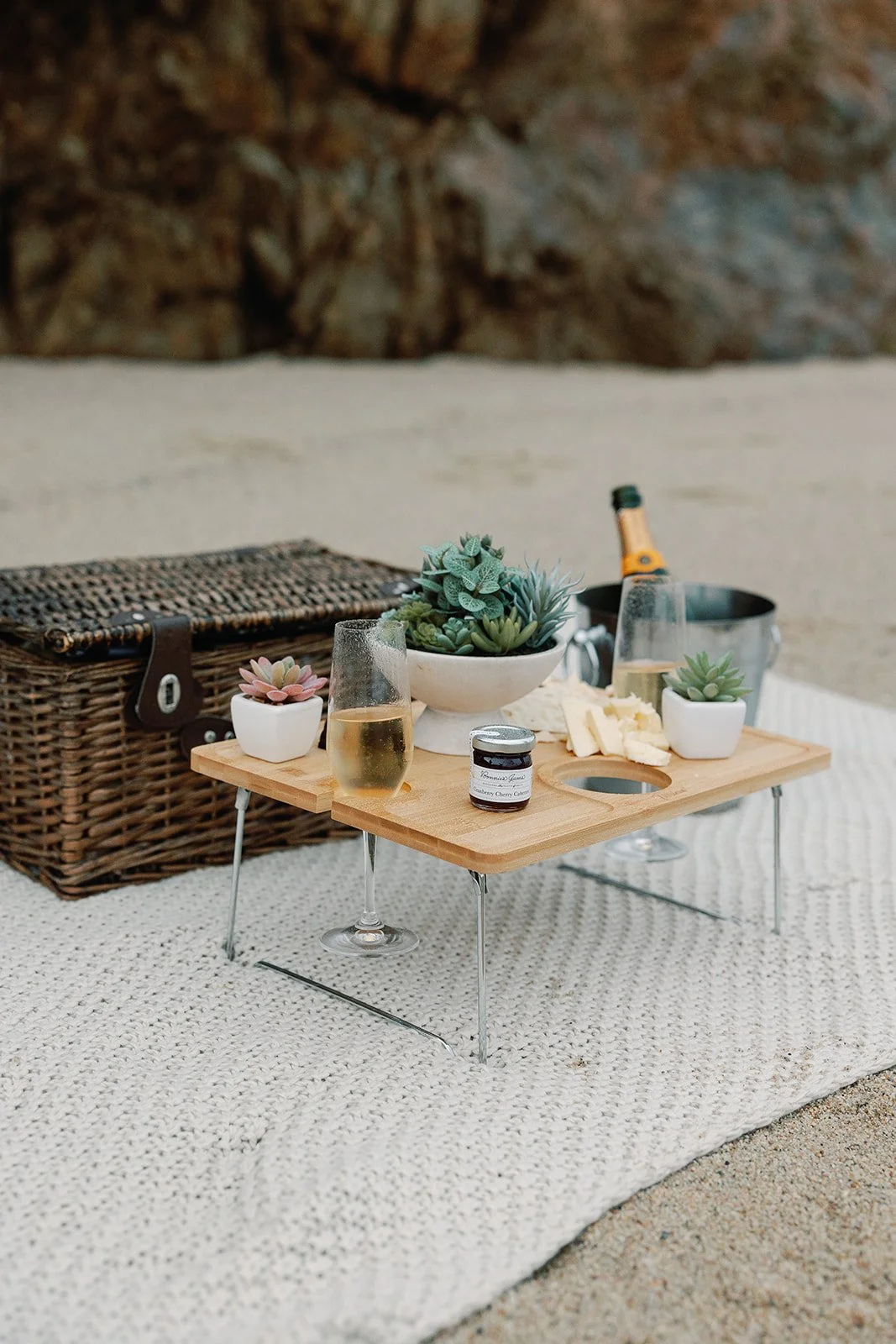 This picnic basket, table, champagne/wine bucket, blanket, glasses, and plants are provided for guests to enjoy.   It’s the setup we used on our engagement day , and we’d love for you to explore and experience the coastline with it as well.