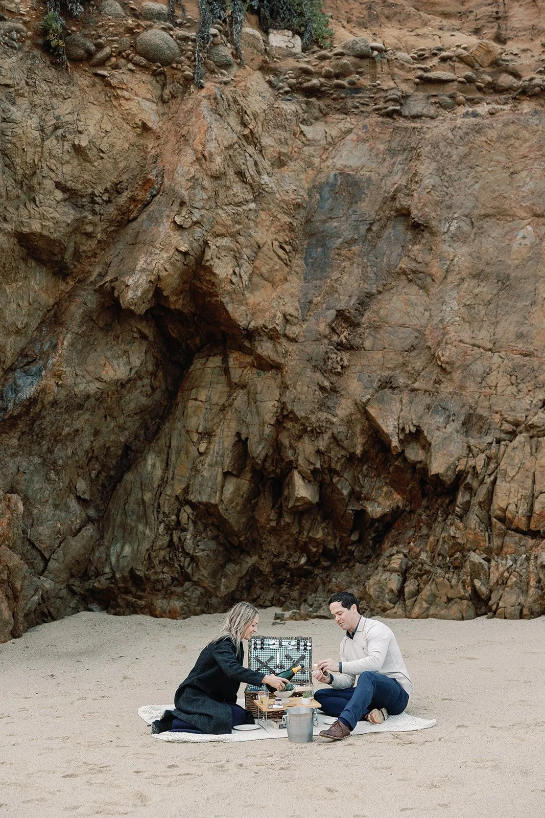 This picnic basket, table, champagne/wine bucket, blanket, glasses, and plants are provided for guests to enjoy.   It’s the setup we used on our engagement day , and we’d love for you to explore and experience the coastline with it as well.