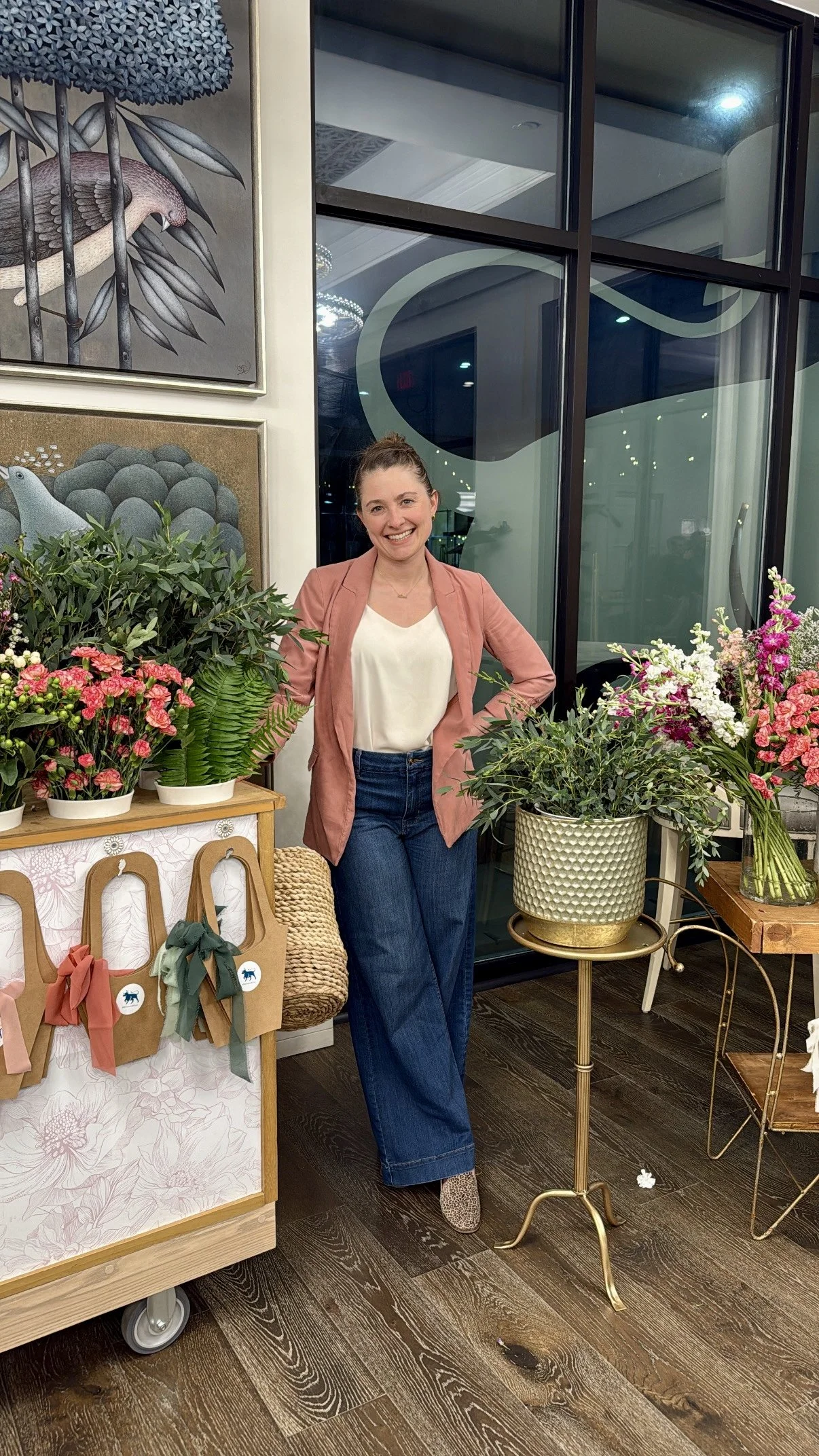 A women standing in front of a flower cart