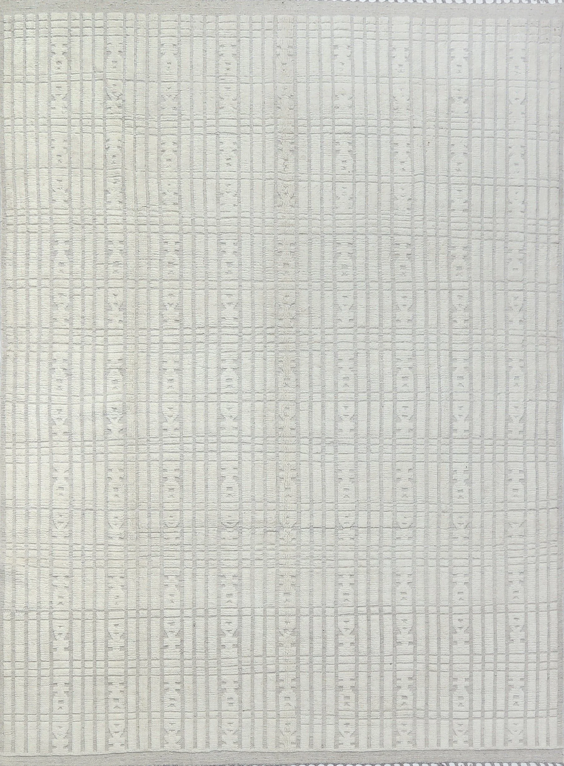 A hand-knotted Moroccan-style 9x12 neutral wool rug.