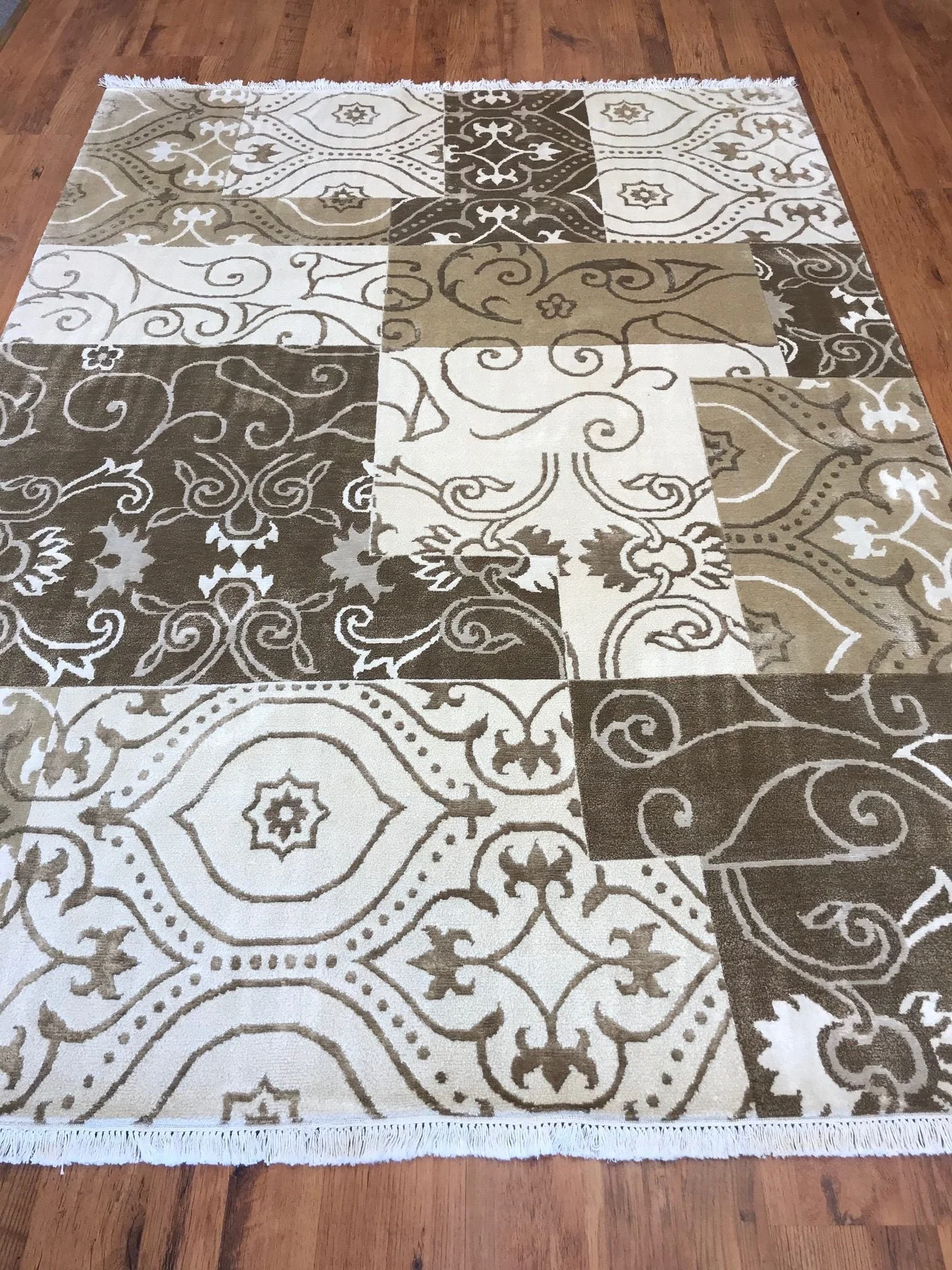 6x8 handmade modern rug in a light colour combination