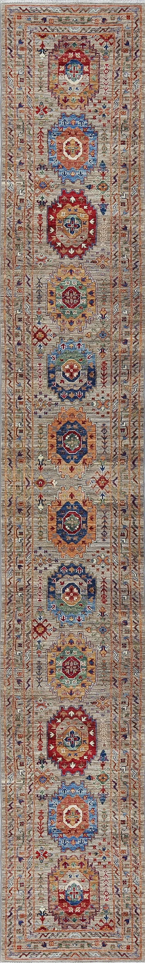 A Super Kazak transitional wool rug runner measuring 19 feet long.