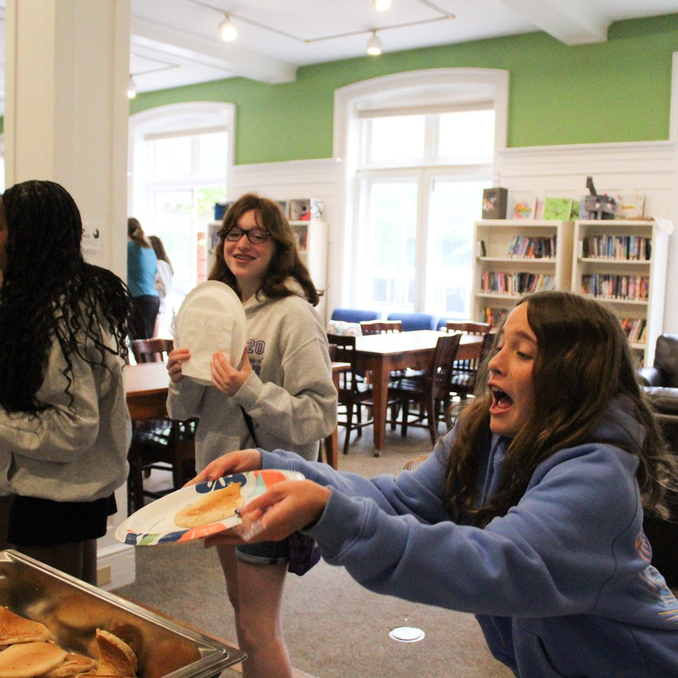 An Orchard House tradition for the last day&mdash;pancakes for all, including airborne pancakes flipped by Ms. Brookman and Mr. Hollander!