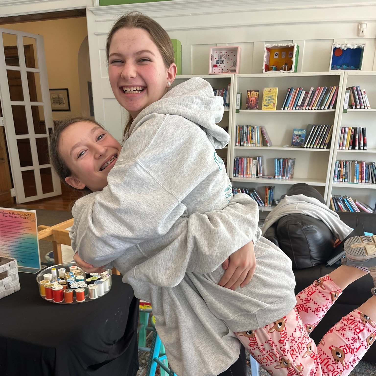 On top of an all-school Pajama Day, the 8s got their class sweatshirts today! Designed by one of their own, the hoodies arrived just in time for Winter Break, which starts Friday.