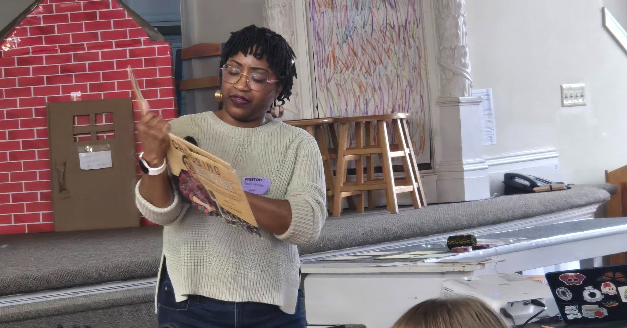 Black History Month presentations continued with two energizing programs. First, papercut artist and author Janelle Washington, who illustrated the Caldecott Honor Award-winning book Choosing Brave about Mamie Till-Mobley, described the materials and