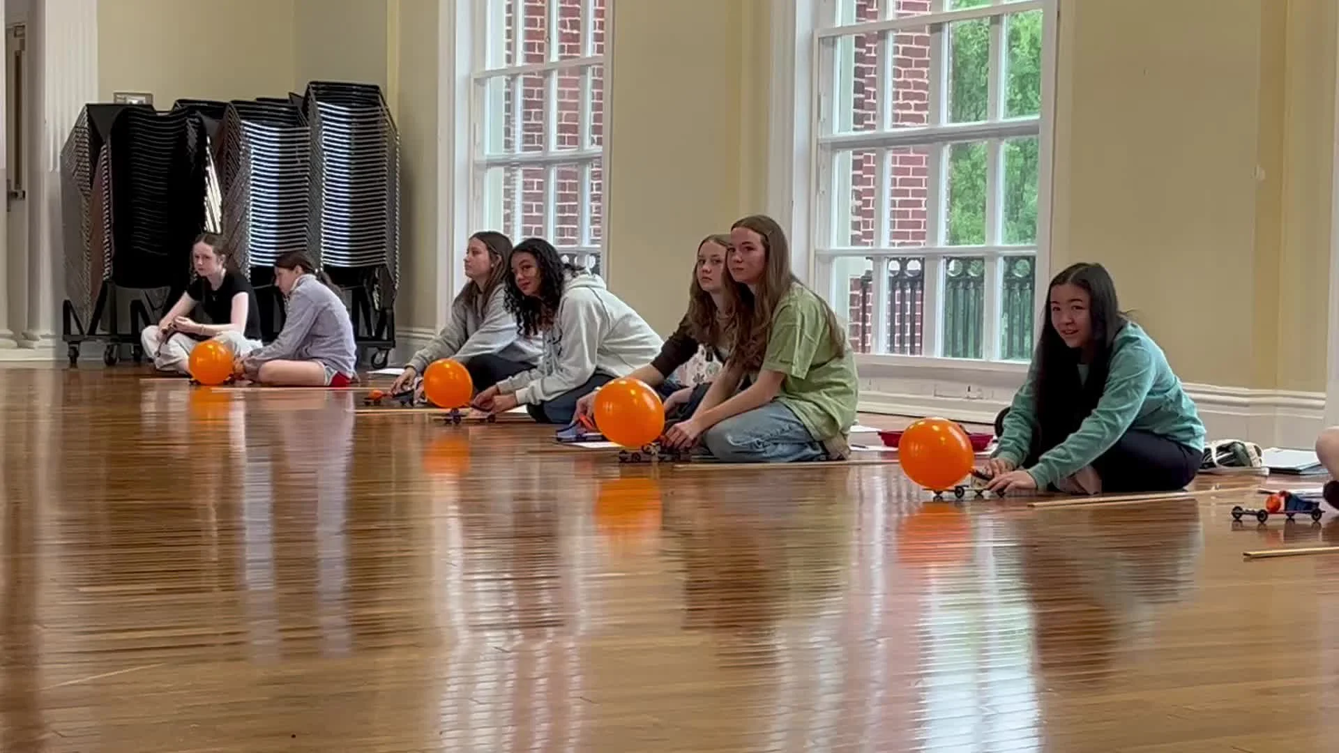 Balloon buggies took over the third floor this morning as their 8th grade creators measured the speed and distance they went using the force created when air escaped from blown-up balloons. There's never a dull moment in Ms. Brookman's science class!