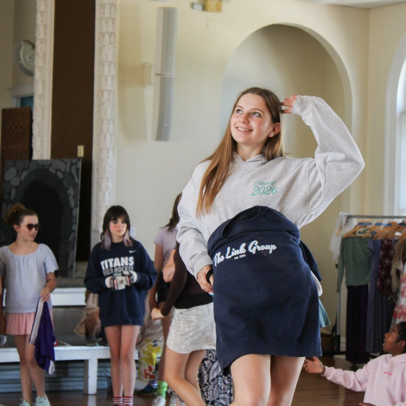 The lost and found bin can pile up, especially during season transitions. Models took to the catwalk to debut the spring collection, reuniting students in the audience with their classic sweatshirts, winter coats, and many, many water bottles.