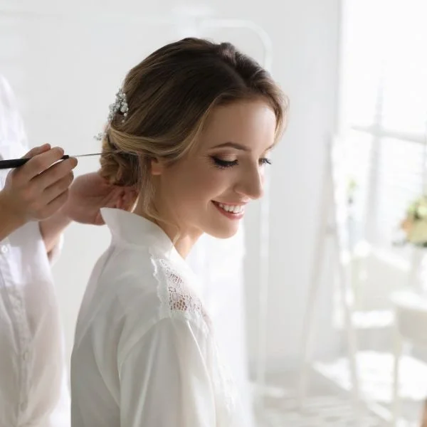 Bride getting ready with glam makeup