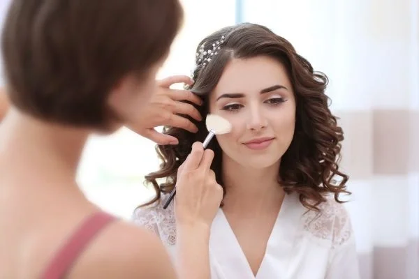 Artist applying hybrid matte and dewy technique