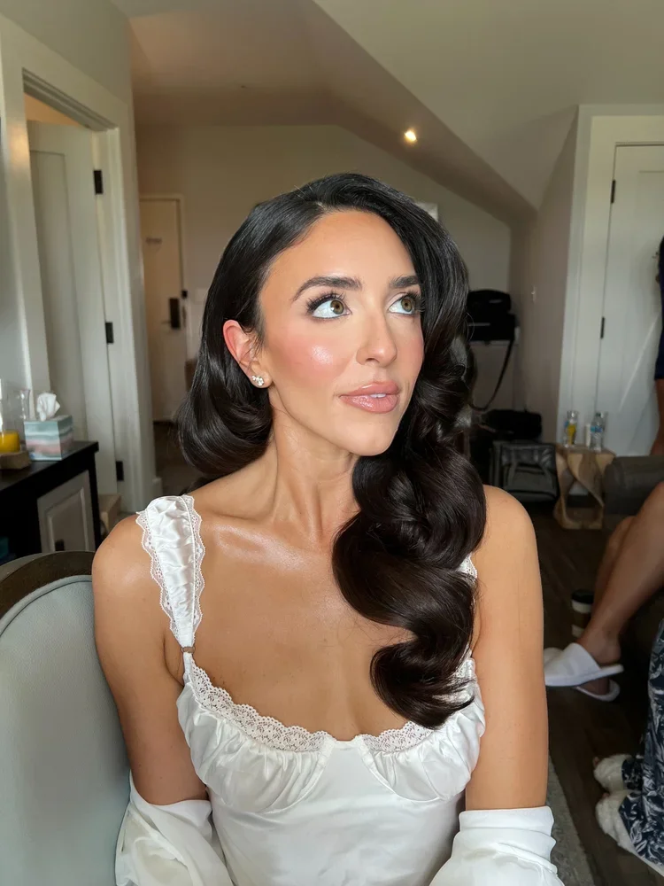soft makeup and wavy hair for the bride