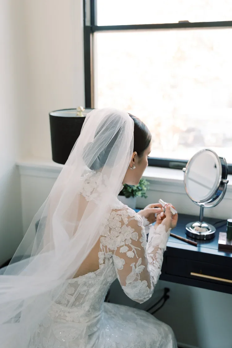 Bride with romantic updo and soft makeup