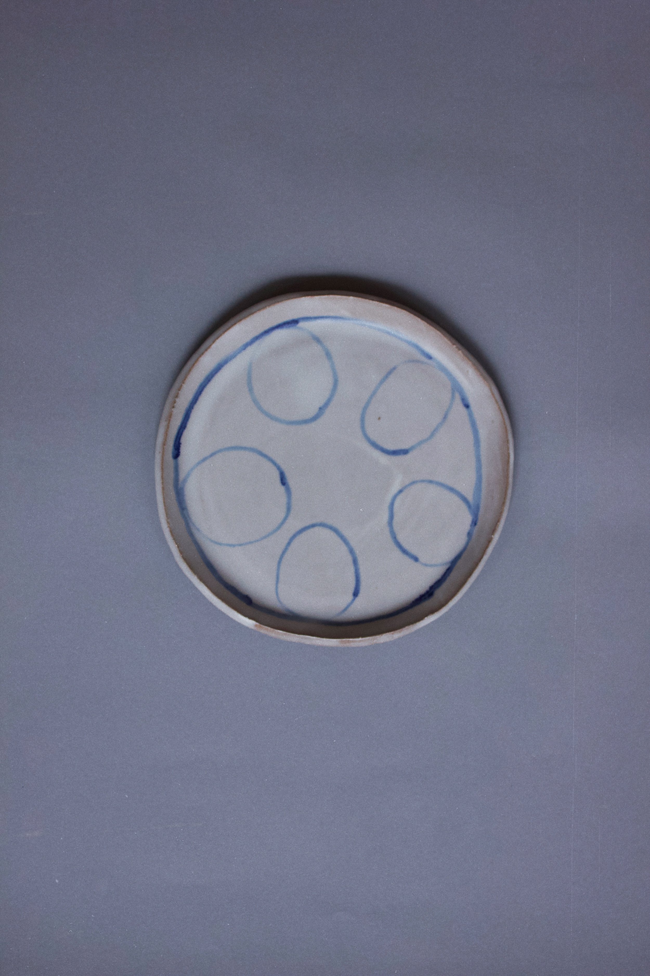 plate with blue egg shapes