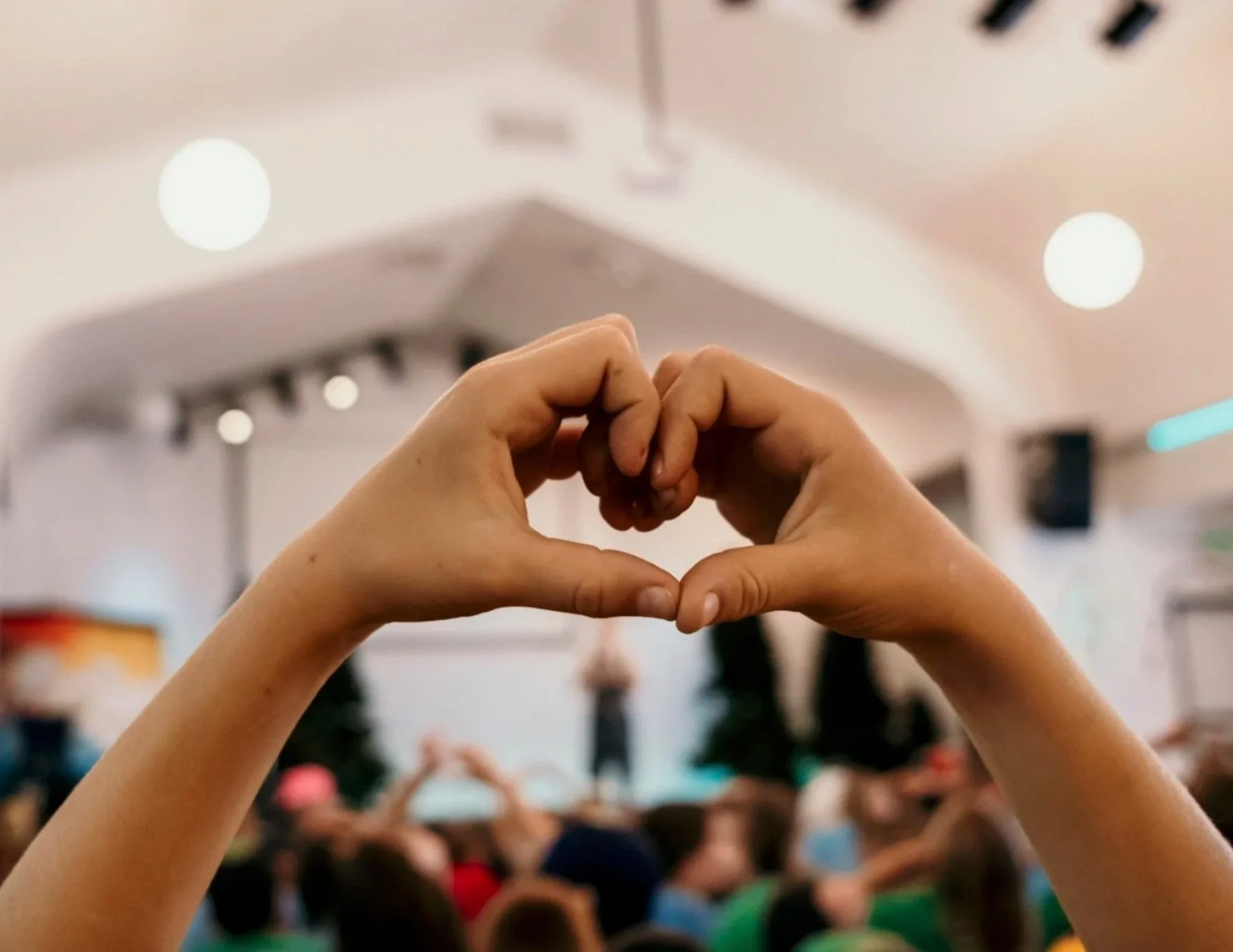 Hand making a heart shape